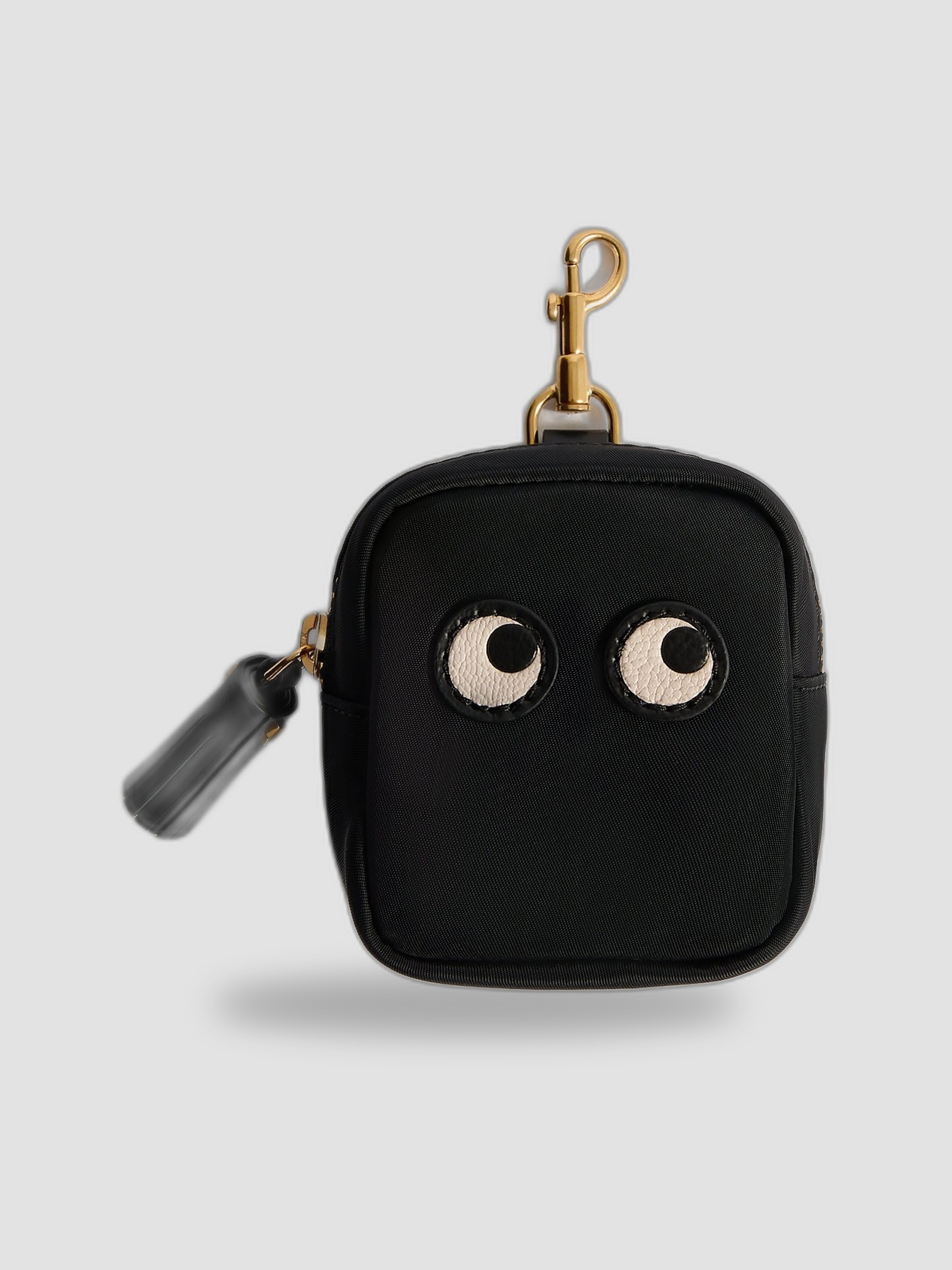 Anya Hindmarch Eyes Ear Phones Travel Pouch in black.