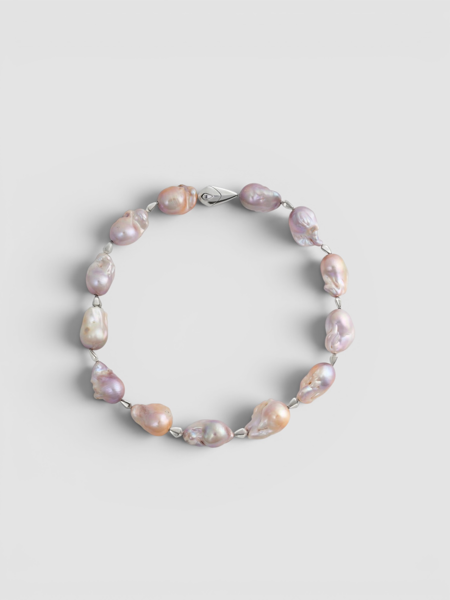 Bottega Veneta Pearl Necklace in silver. Styled by Sharon Lombardo for FDV Concierge.