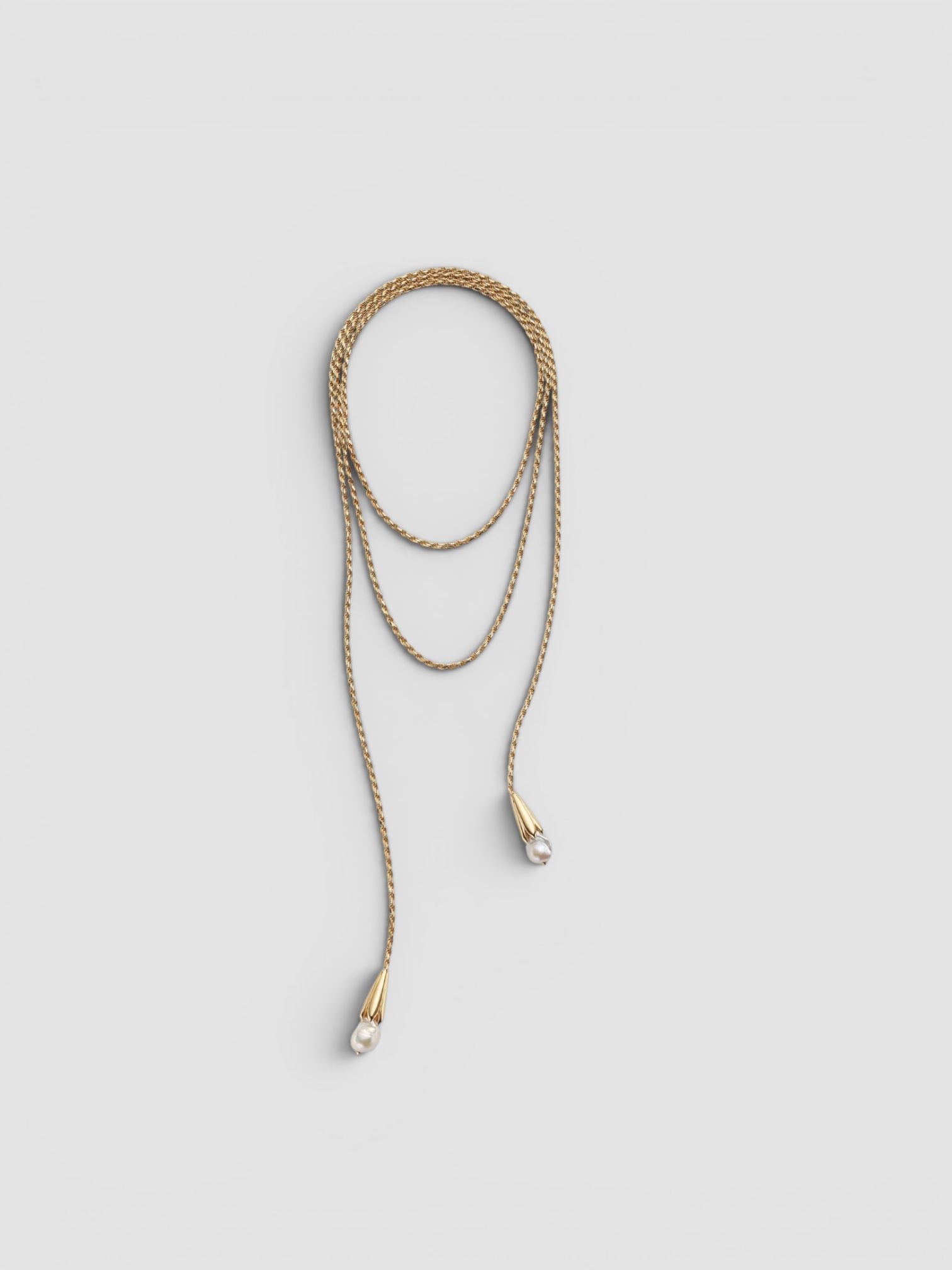 Bottega Veneta Pearl Scarf Necklace in gold / pearl. Styled by Sharon Lombardo for FDV Concierge.