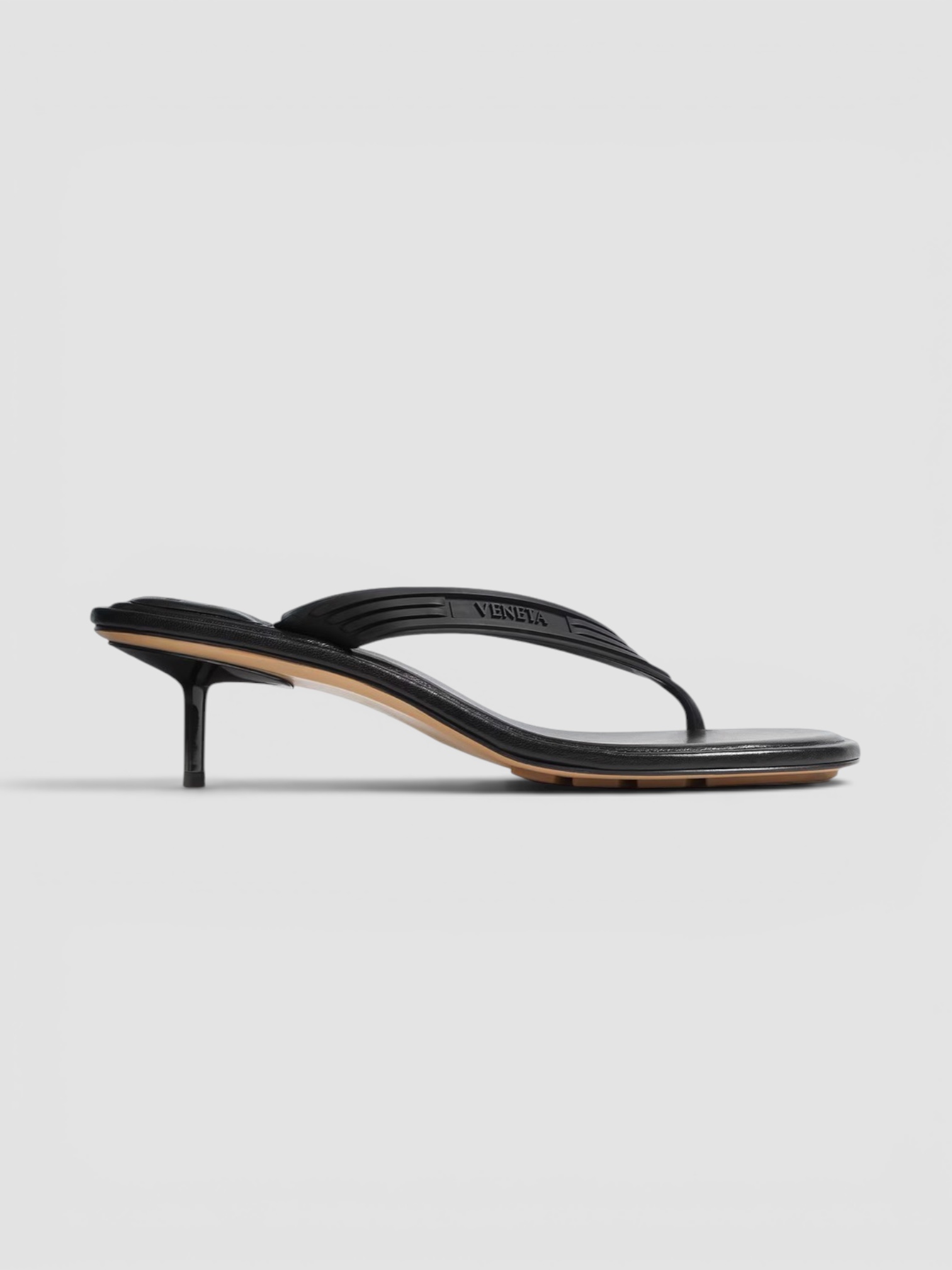Bottega Veneta Sampieri Thong in black. Styled by Sharon Lombardo for FDV Concierge.