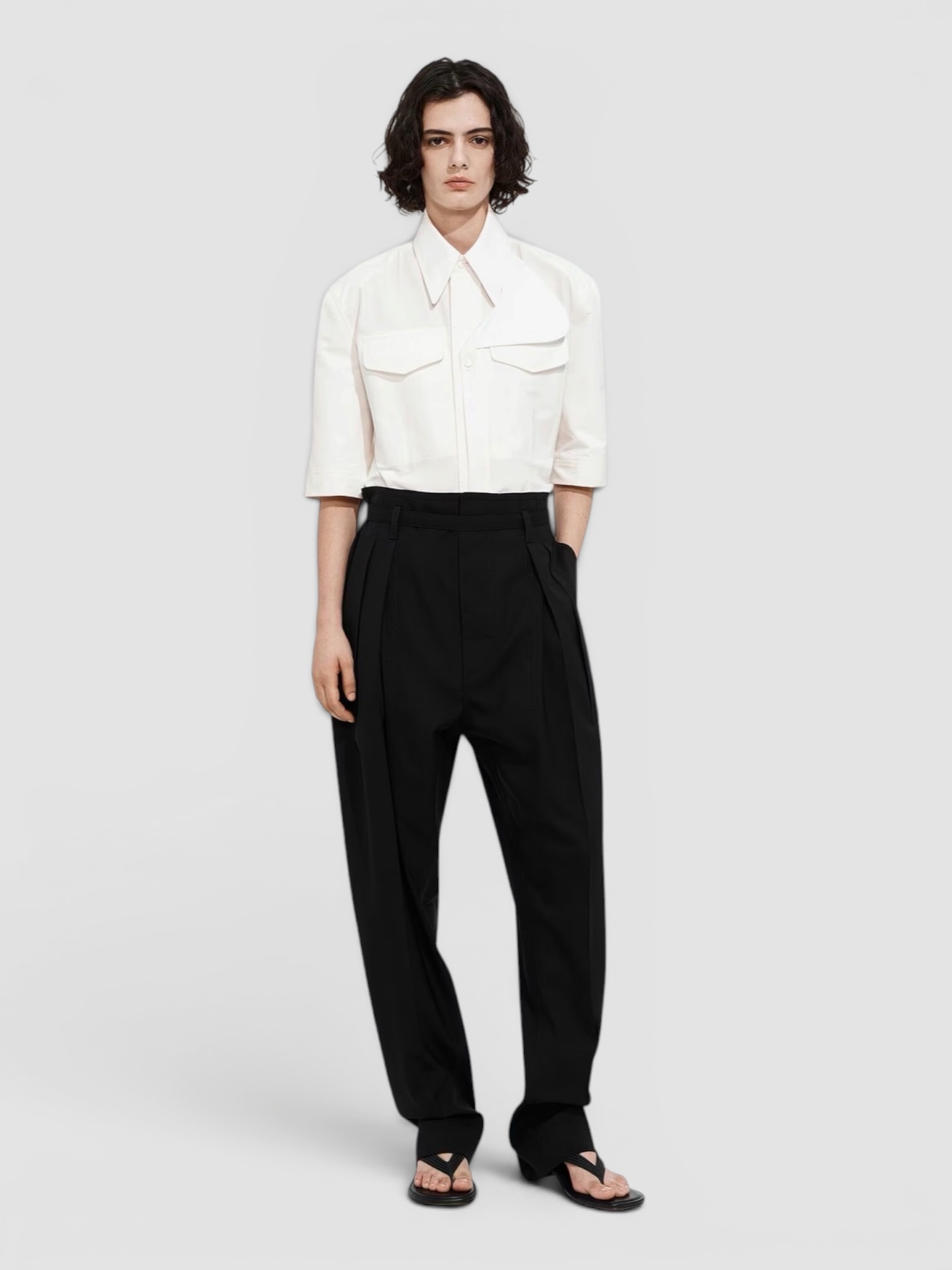Bottega Veneta Sampieri Thong in black. Styled by Sharon Lombardo for FDV Concierge.