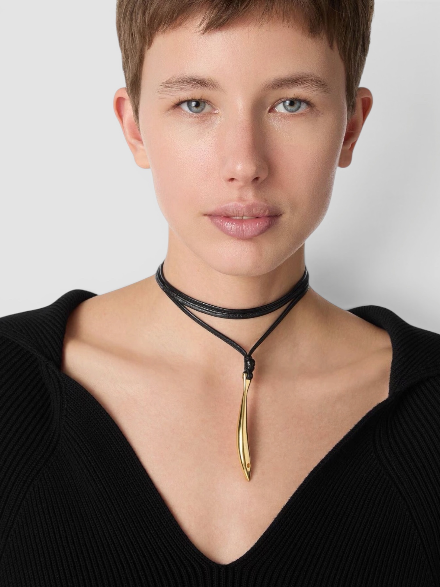 Bottega Veneta Sardine Leather Necklace in black / gold, worn with Toteme Lyocell-Blend Tapered Pants, Róhe Off Shoulder Lapel Top, Bottega Veneta Salsa Thong, Phoebe Philo Gig Leather Shoulder Bag, the evening. Styled by Sharon Lombardo for FDV Concierge.