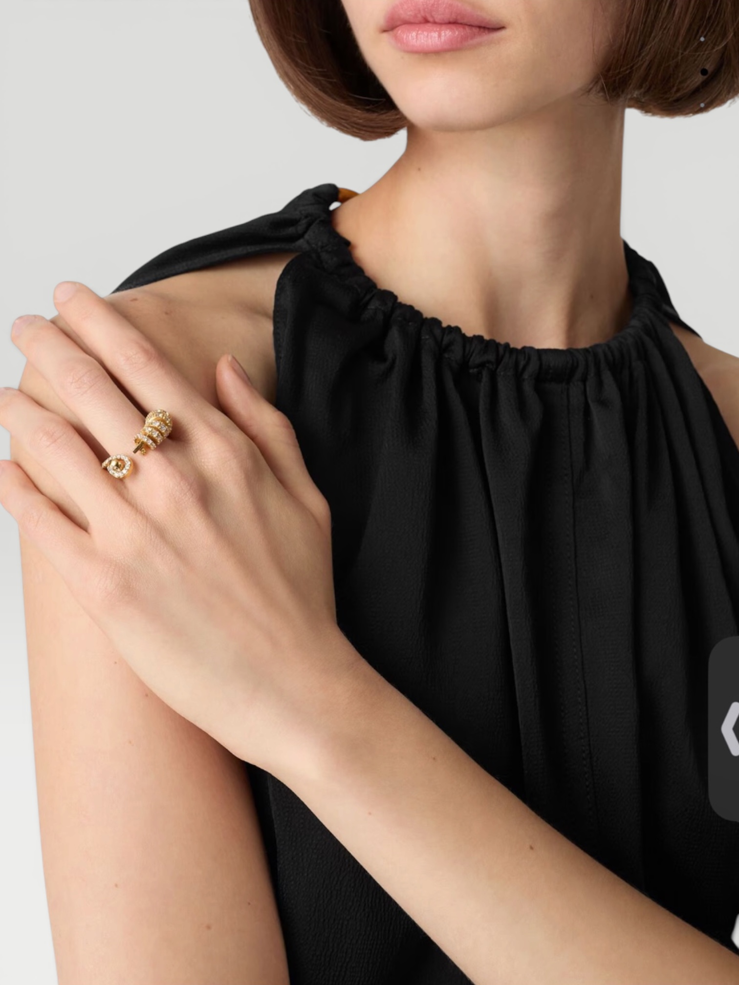 Bottega Veneta Twist Ring in yellow gold. Styled by Sharon Lombardo for FDV Concierge.