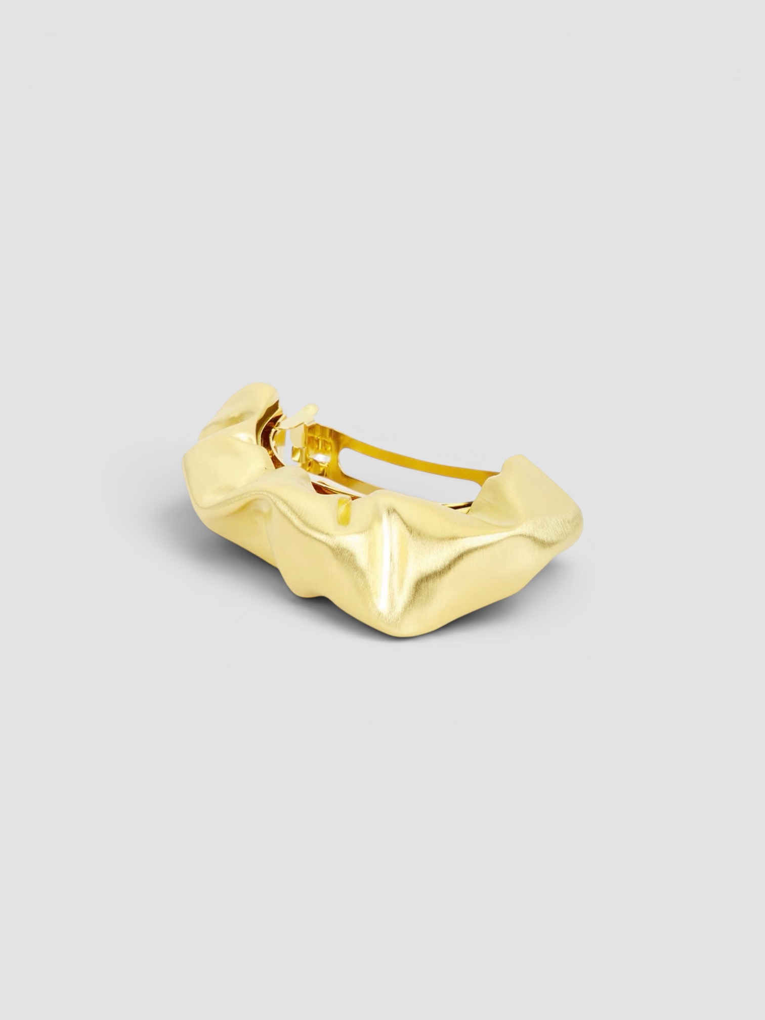 Completedworks Hair Barrette in 18k gold plated.