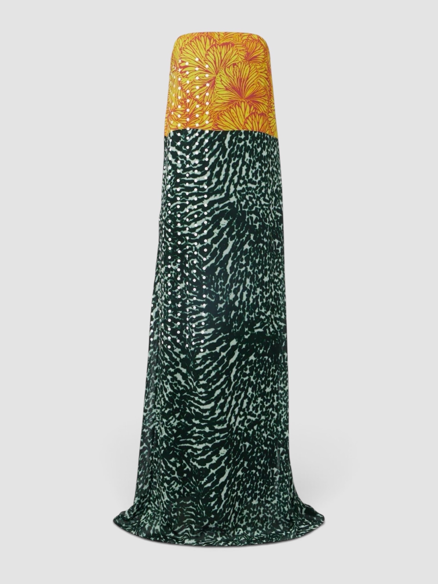 Dries Van Noten Printed Strapless Georgette Gown, worn with Phoebe Philo Frizz Flip Flop, Loewe Leather-Trimmed Raffia Tote, Phoebe Philo Peak Sunglasses, Sarah Creal Brilliant Repair Shield SPF 50 Illuminating Serum Broad Spectrum Sunscreen, on the water. Styled by Sharon Lombardo for FDV Concierge.
