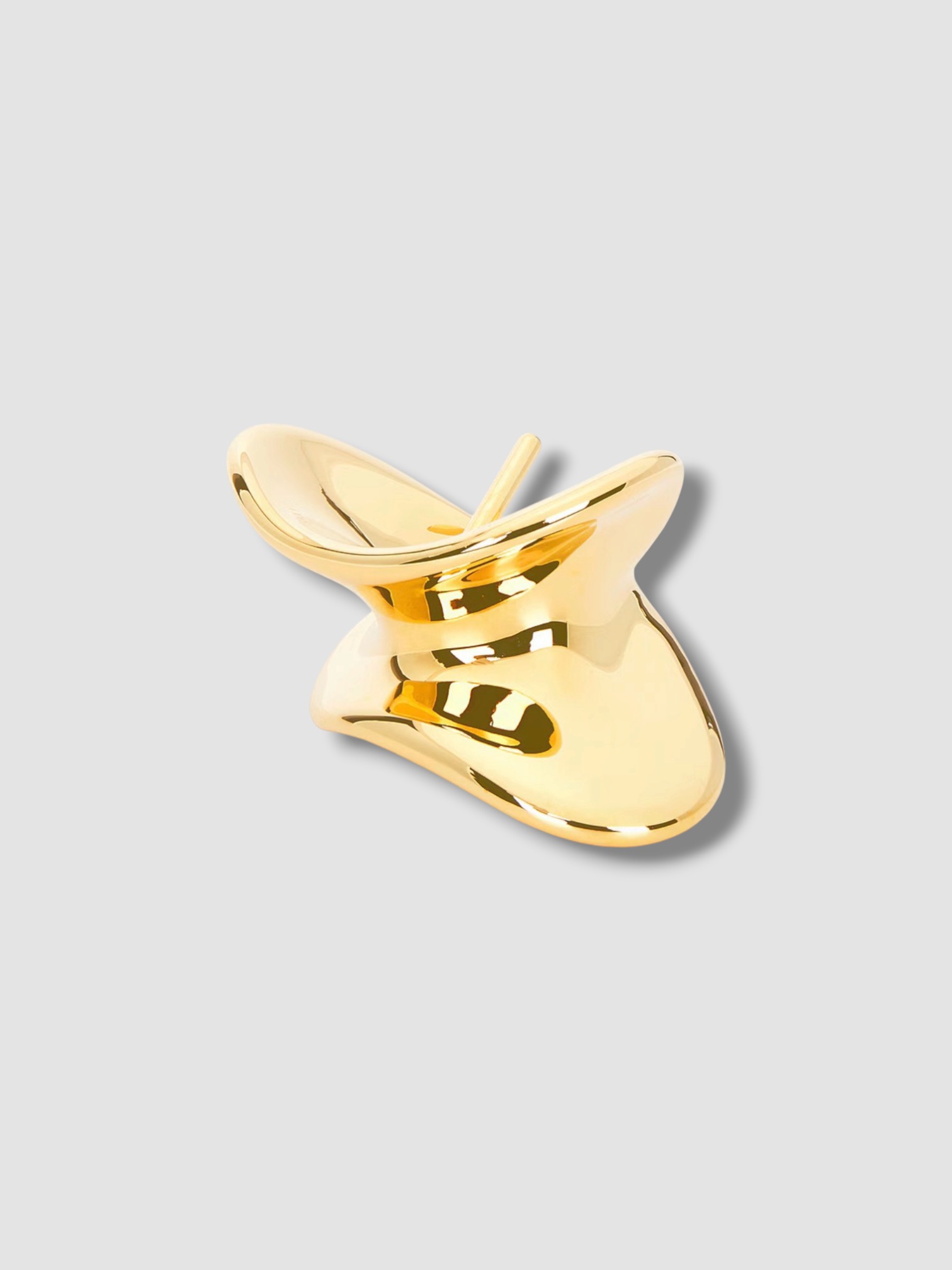Khaite Shadow Hair Cuff in gold.