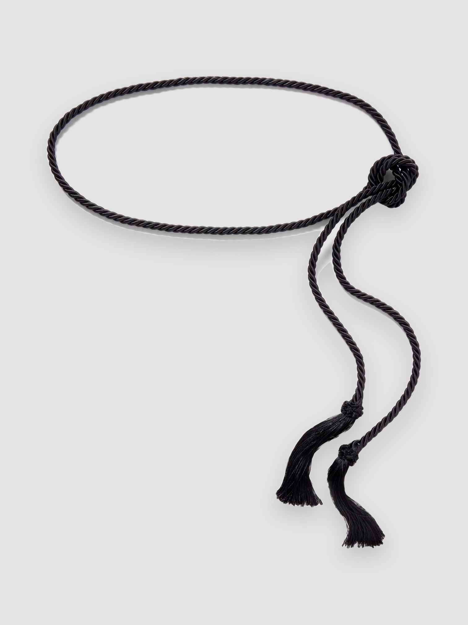 Le Sundial Tasseled Woven Cord Belt in black.