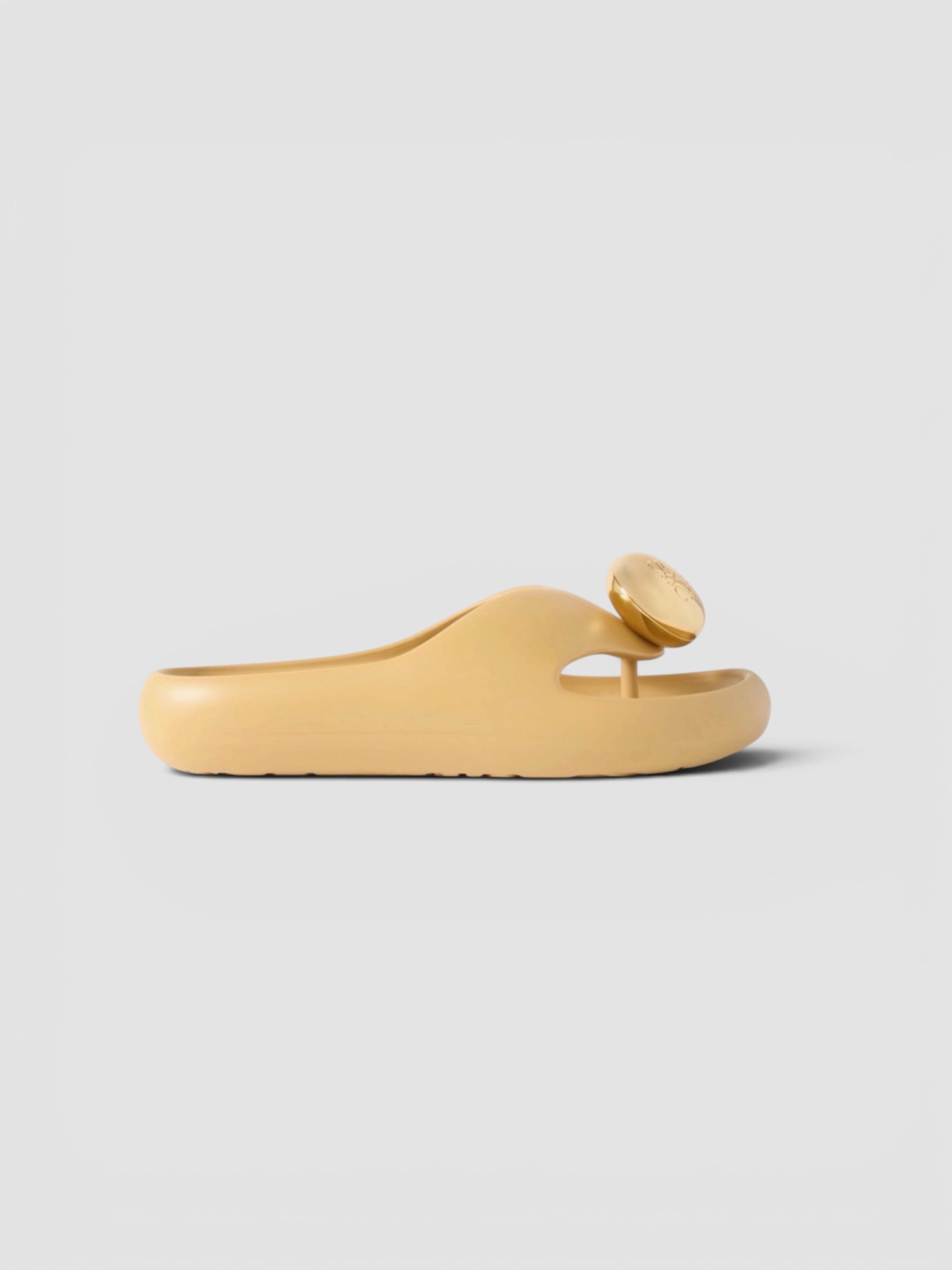 Loewe Paula's Ibiza Foam Pebble Sandal in beige.