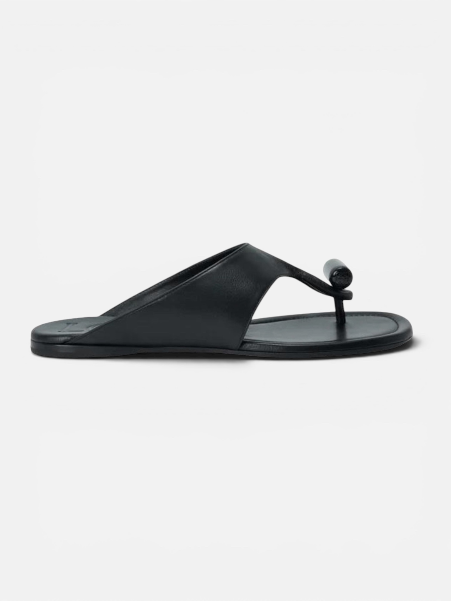 Loewe Toggle Flat Sandal in black, worn with Scanlan Theodore Parachute Cotton Halter Dress. Styled by Sharon Lombardo for FDV Concierge.