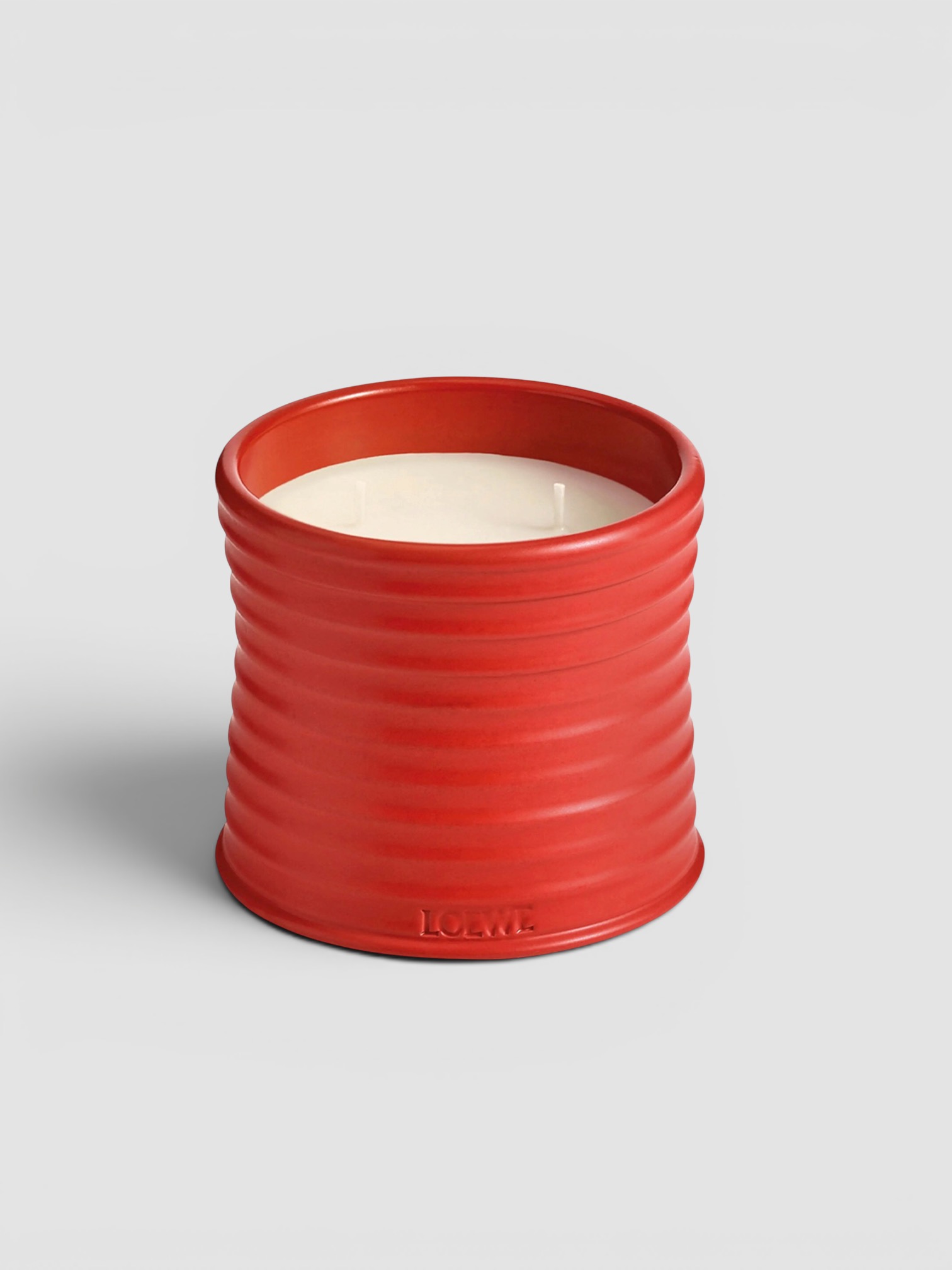 Loewe Tomato Leaves Medium Scented Candle in red.