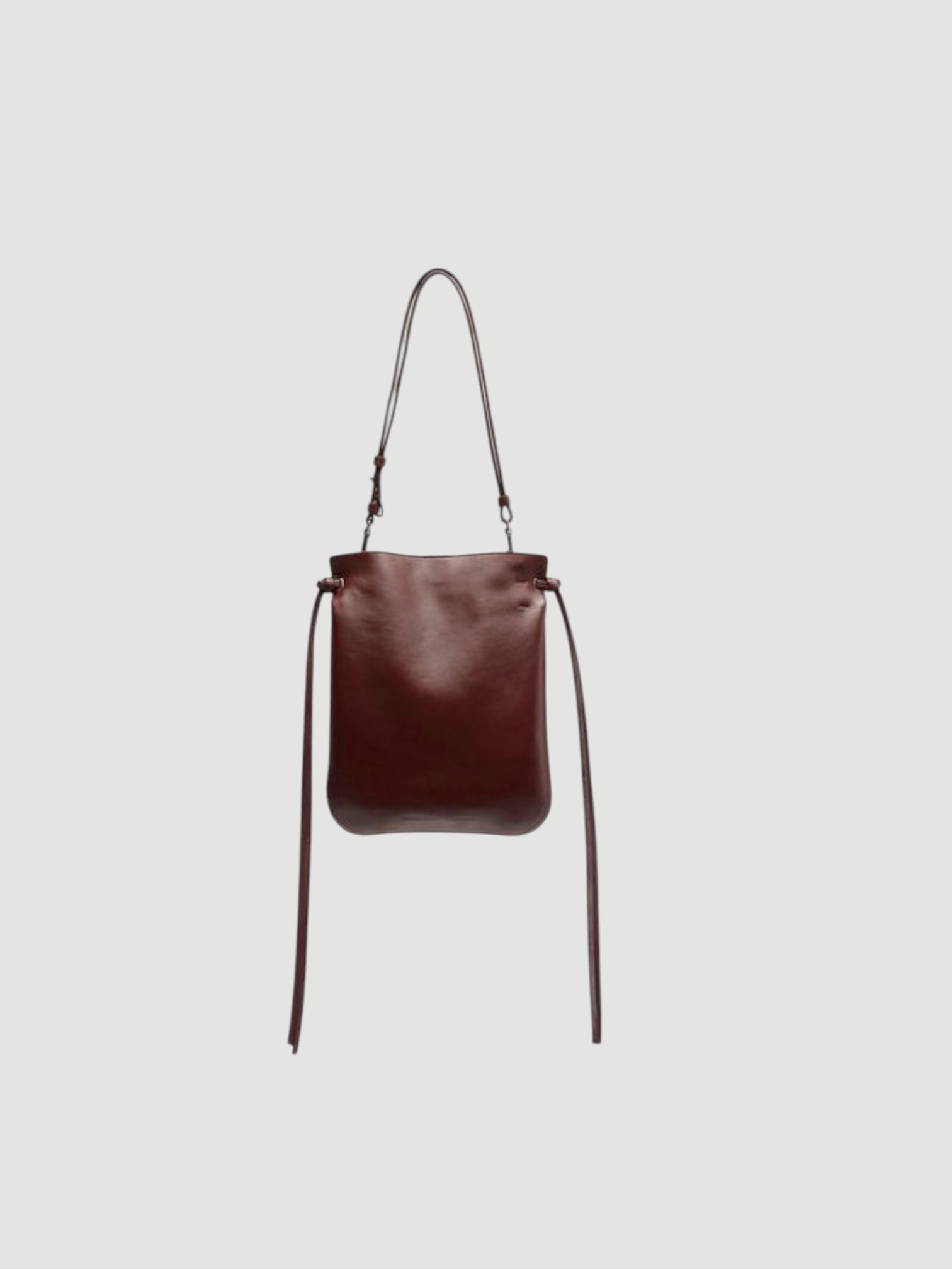 Phoebe Philo Gig Pouch Leather Shoulder Bag in oxblood silver, worn with St. Agni Relaxed Tee Dress. Styled by Sharon Lombardo for FDV Concierge.