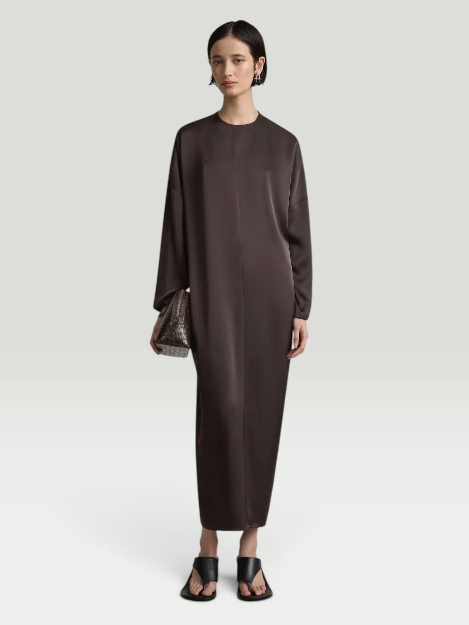 A.Emery The Sisco Dress in bistre, worn with Bottega Veneta Salsa Thong. Styled by Sharon Lombardo for FDV Concierge.