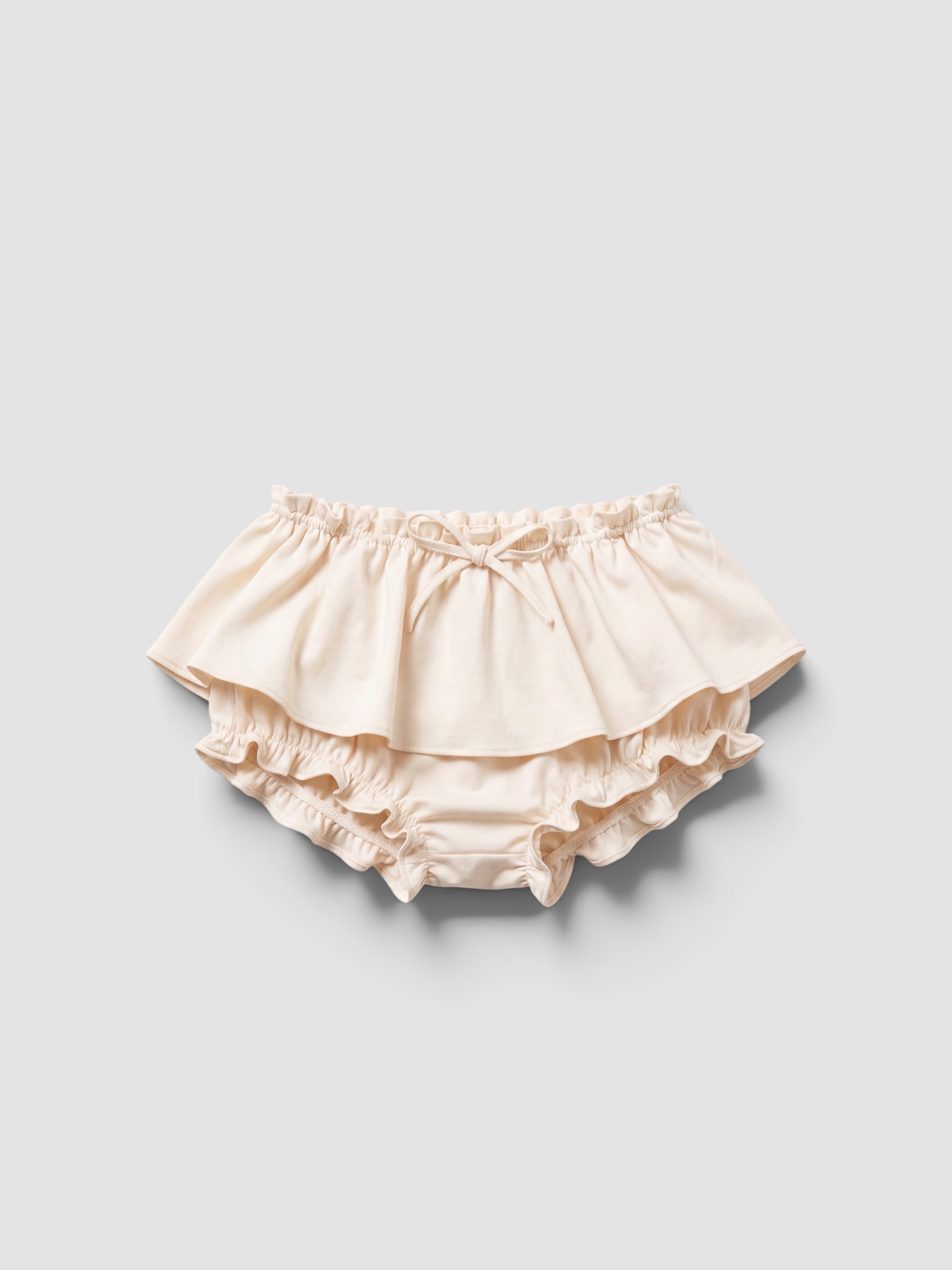 AKNVAS Aja Satin Bloomer Skirt in cream. Styled by Sharon Lombardo for FDV Concierge.