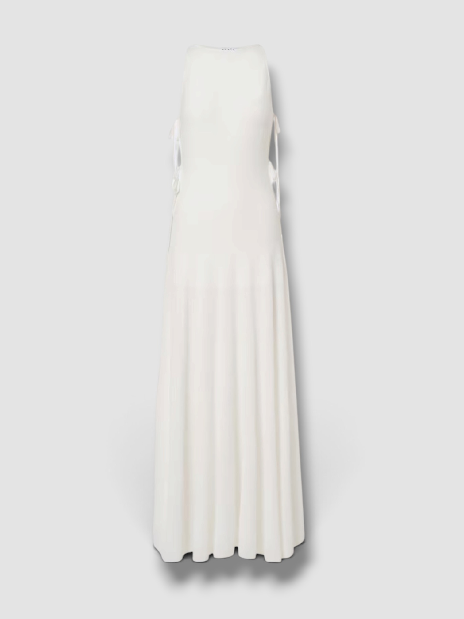 Alaïa Cotton-Blend Crêpe Maxi Dress in blanc naturel. Styled by Sharon Lombardo for FDV Concierge.