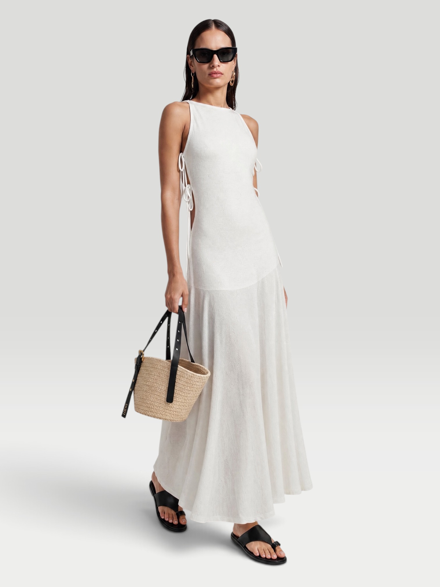 Alaïa Cotton-Blend Crêpe Maxi Dress in blanc naturel. Styled by Sharon Lombardo for FDV Concierge.