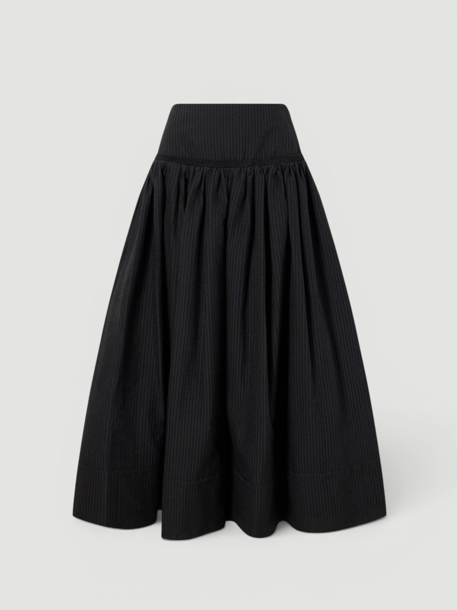 Alaïa Cotton Midi Skirt in black. Styled by Sharon Lombardo for FDV Concierge.