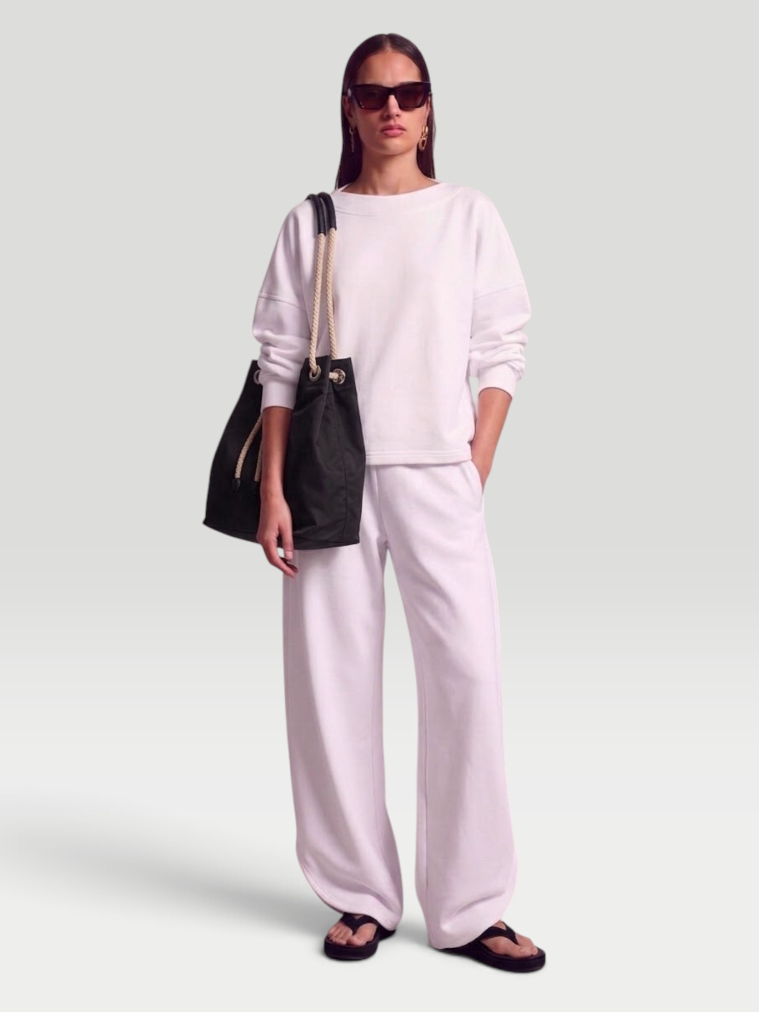 Alaïa Cotton Sweatshirt in white. Styled by Sharon Lombardo for FDV Concierge.