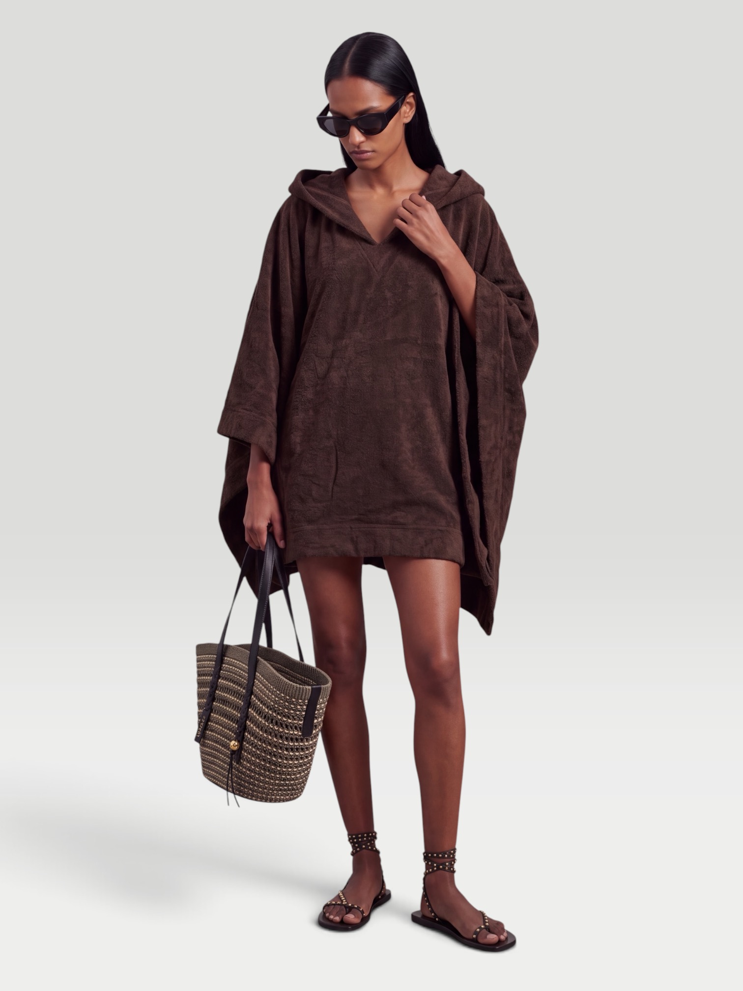 Alaïa Cotton Terry Hoodie in cafe. Styled by Sharon Lombardo for FDV Concierge.