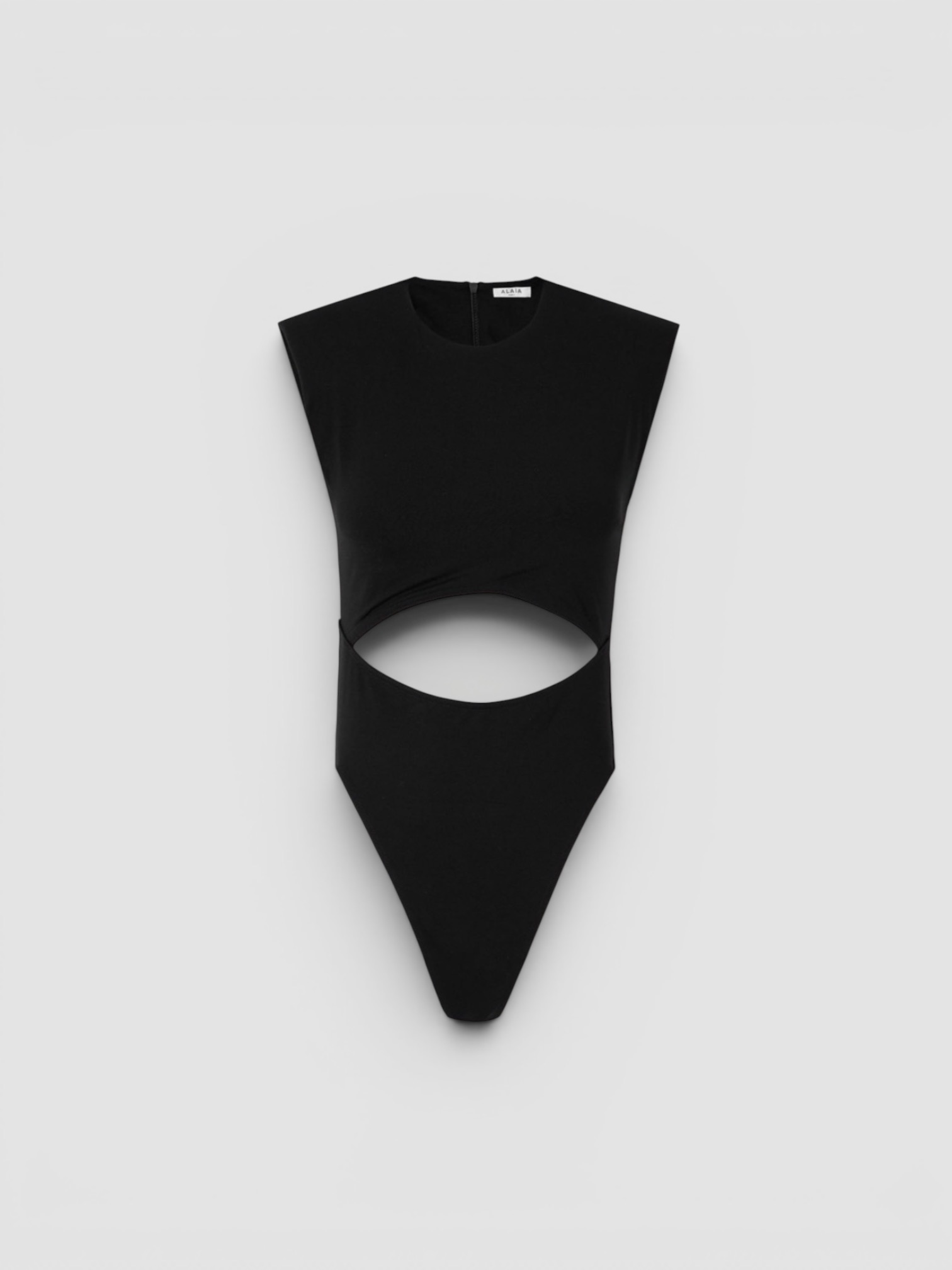 Alaïa Crew Neck Cut Out in black. Styled by Sharon Lombardo for FDV Concierge.