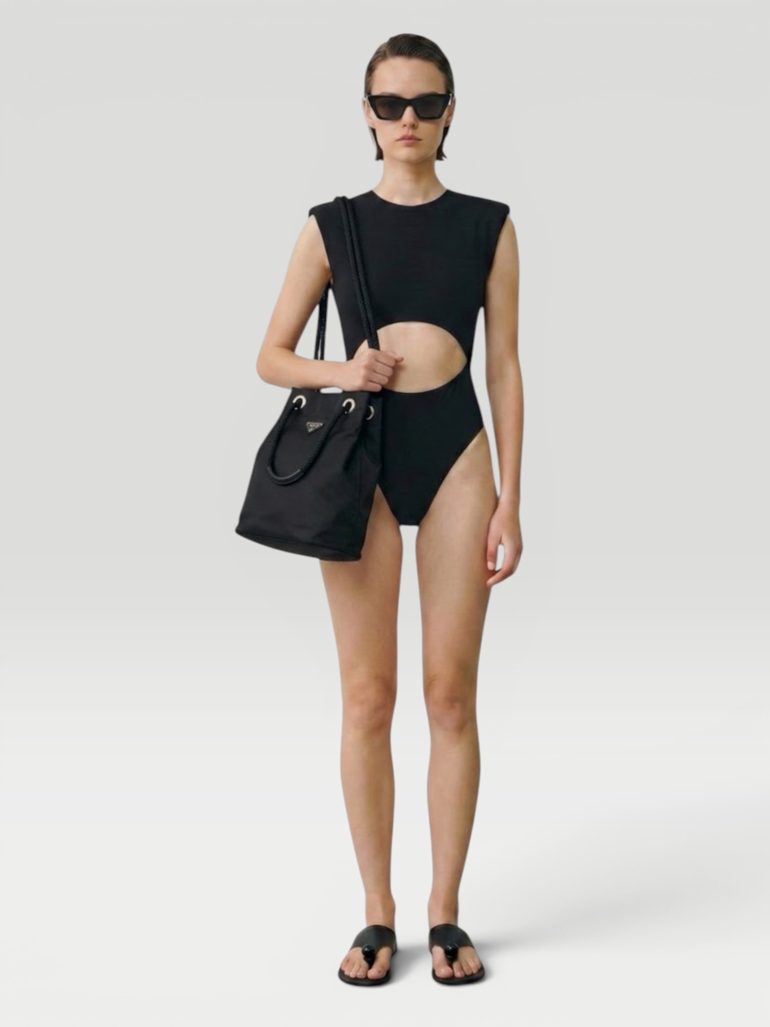 Alaïa Crew Neck Cut Out in black. Styled by Sharon Lombardo for FDV Concierge.