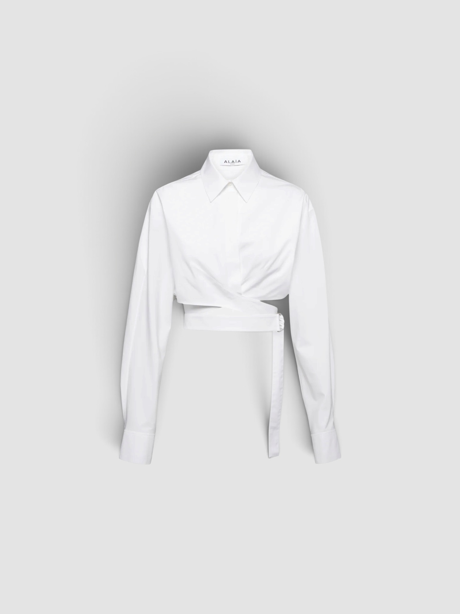 Alaïa Cropped Cotton Poplin Shirt in white. Styled by Sharon Lombardo for FDV Concierge.