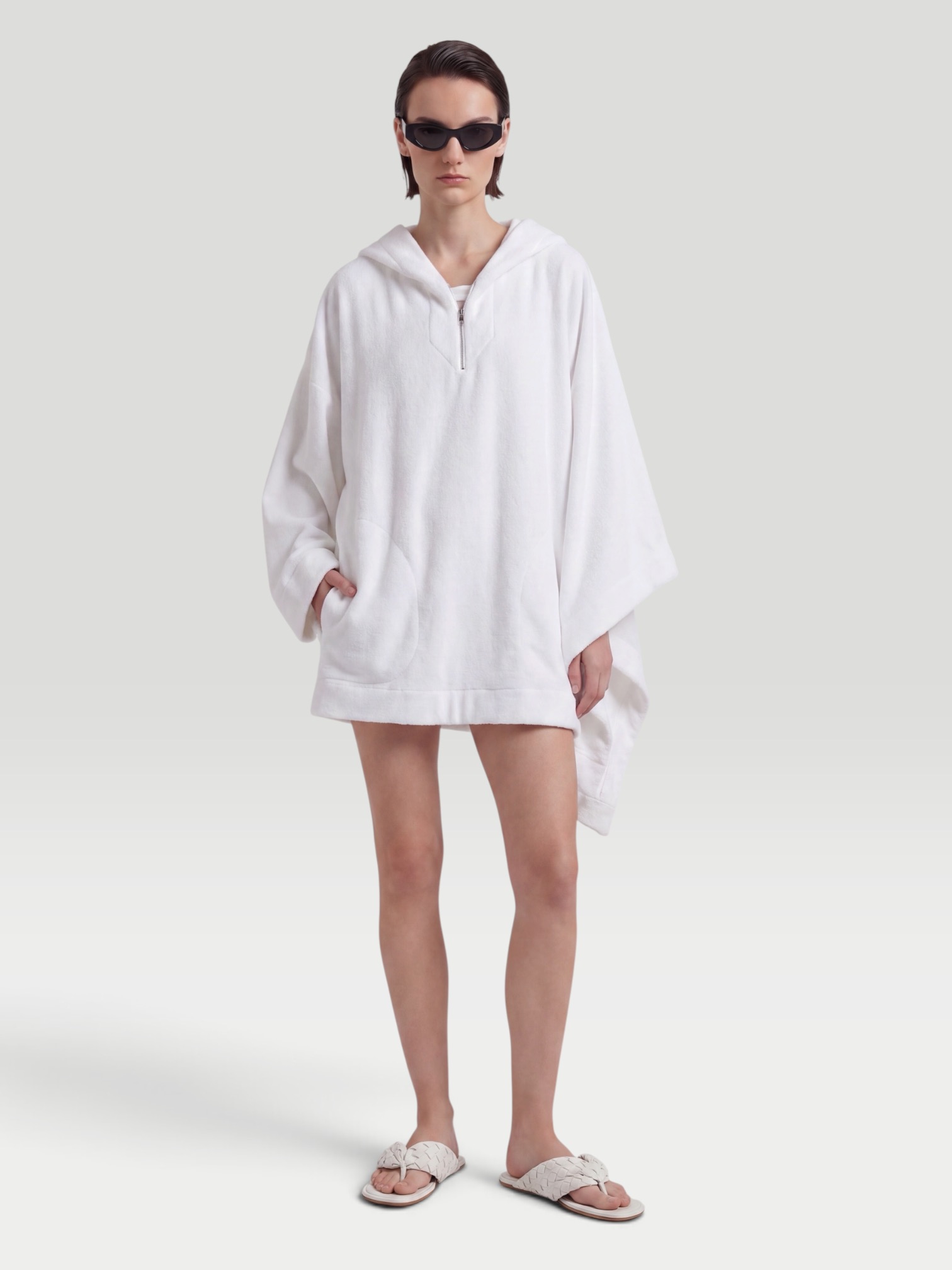 Alaïa Cropped Cotton Terry Hoodie in blanc. Styled by Sharon Lombardo for FDV Concierge.