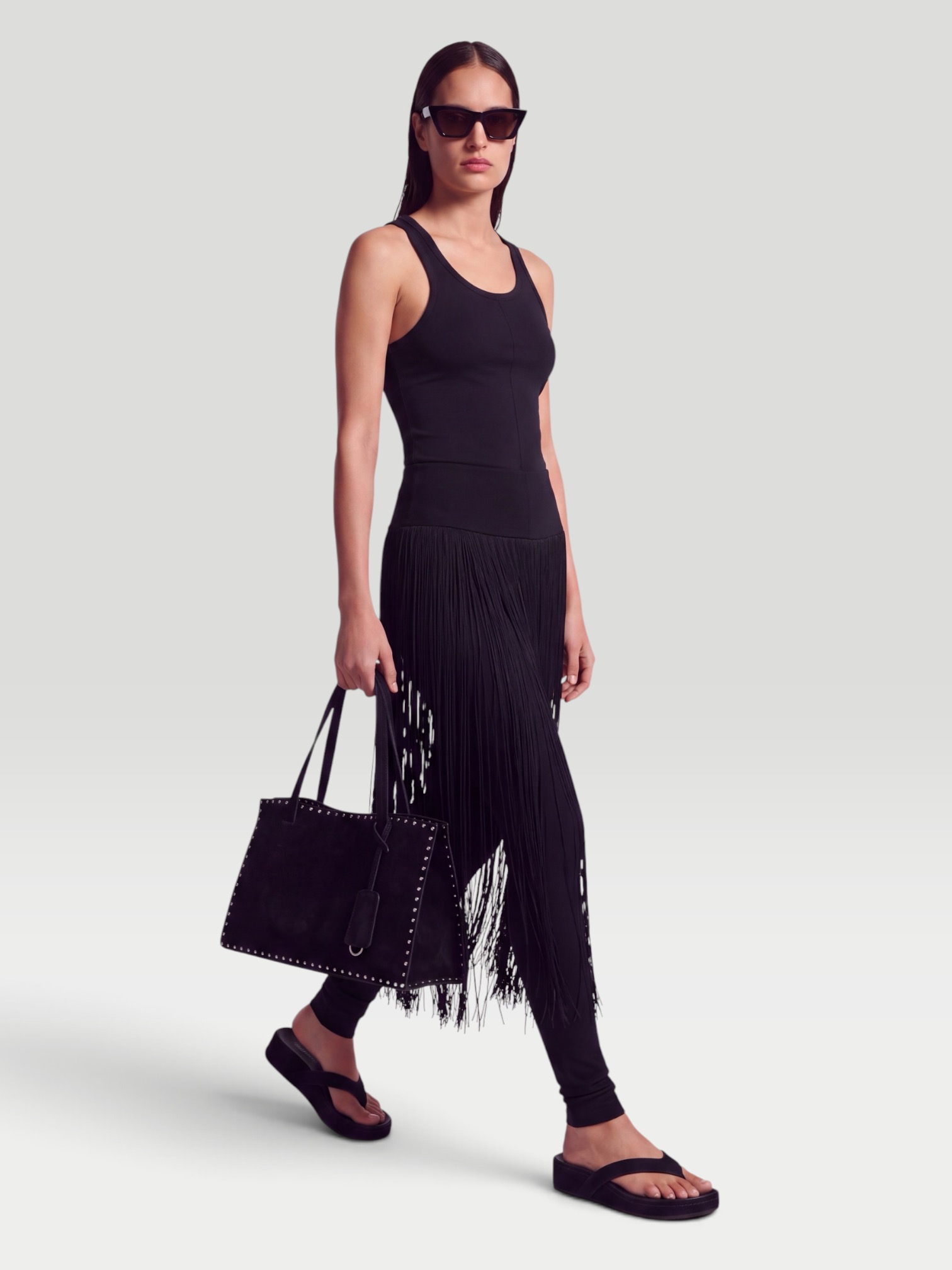 Alaïa Fringed Leggings in noir alaïa. Styled by Sharon Lombardo for FDV Concierge.