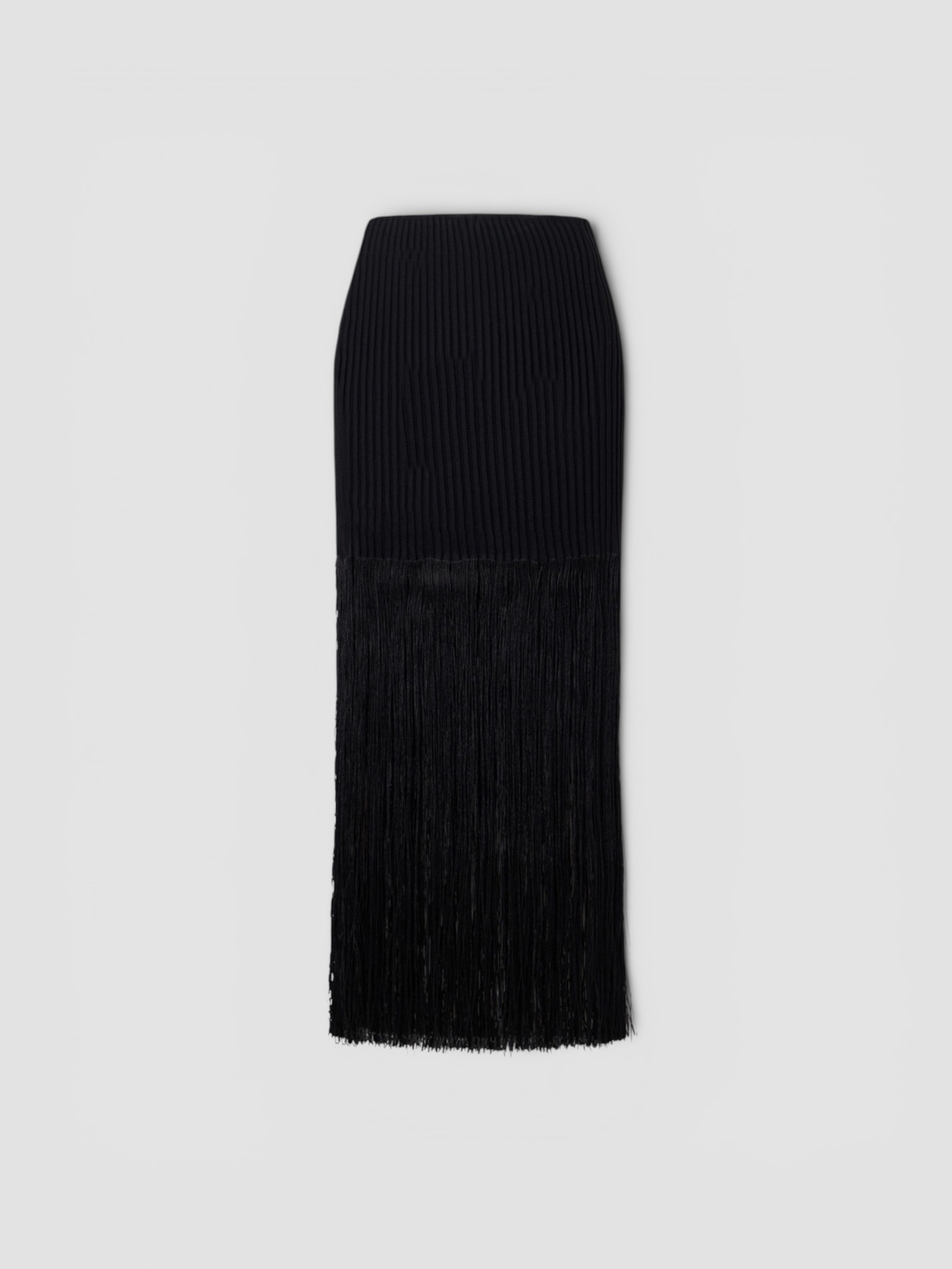 Alaïa Fringed Skirt in black. Styled by Sharon Lombardo for FDV Concierge.