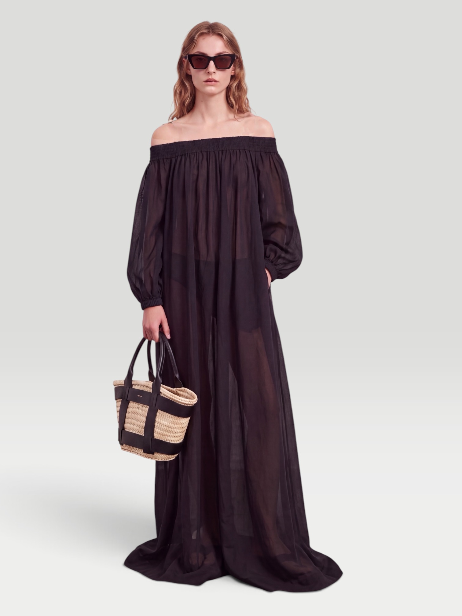 Alaïa Off-Shoulder Maxi Dress in black. Styled by Sharon Lombardo for FDV Concierge.