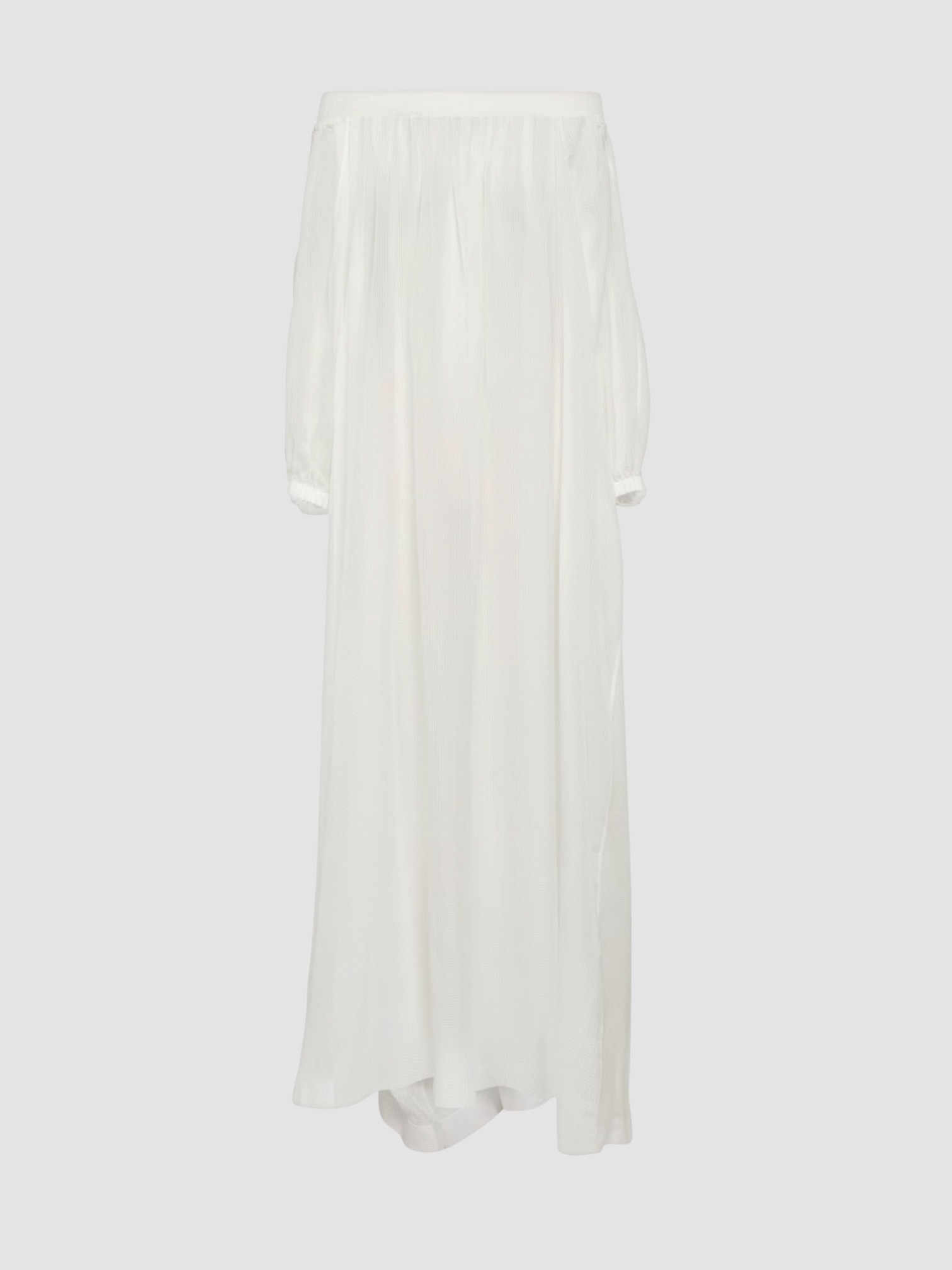 Alaïa Off-Shoulder Maxi Dress in white. Styled by Sharon Lombardo for FDV Concierge.