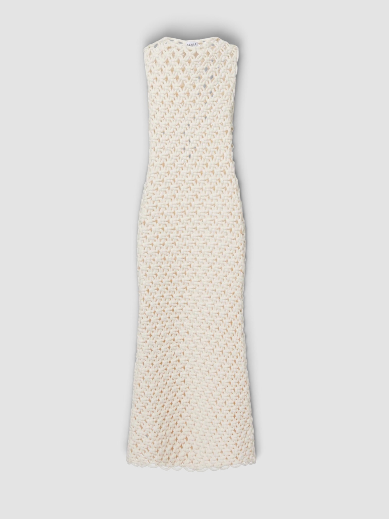 Alaïa Open-Knit Cotton-Blend Maxi Dress in white. Styled by Sharon Lombardo for FDV Concierge.