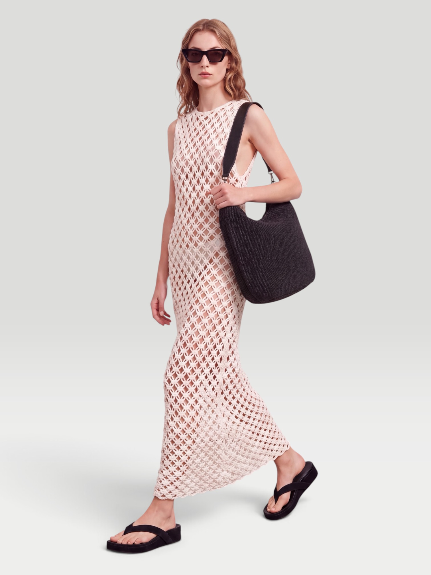 Alaïa Open-Knit Cotton-Blend Maxi Dress in white. Styled by Sharon Lombardo for FDV Concierge.