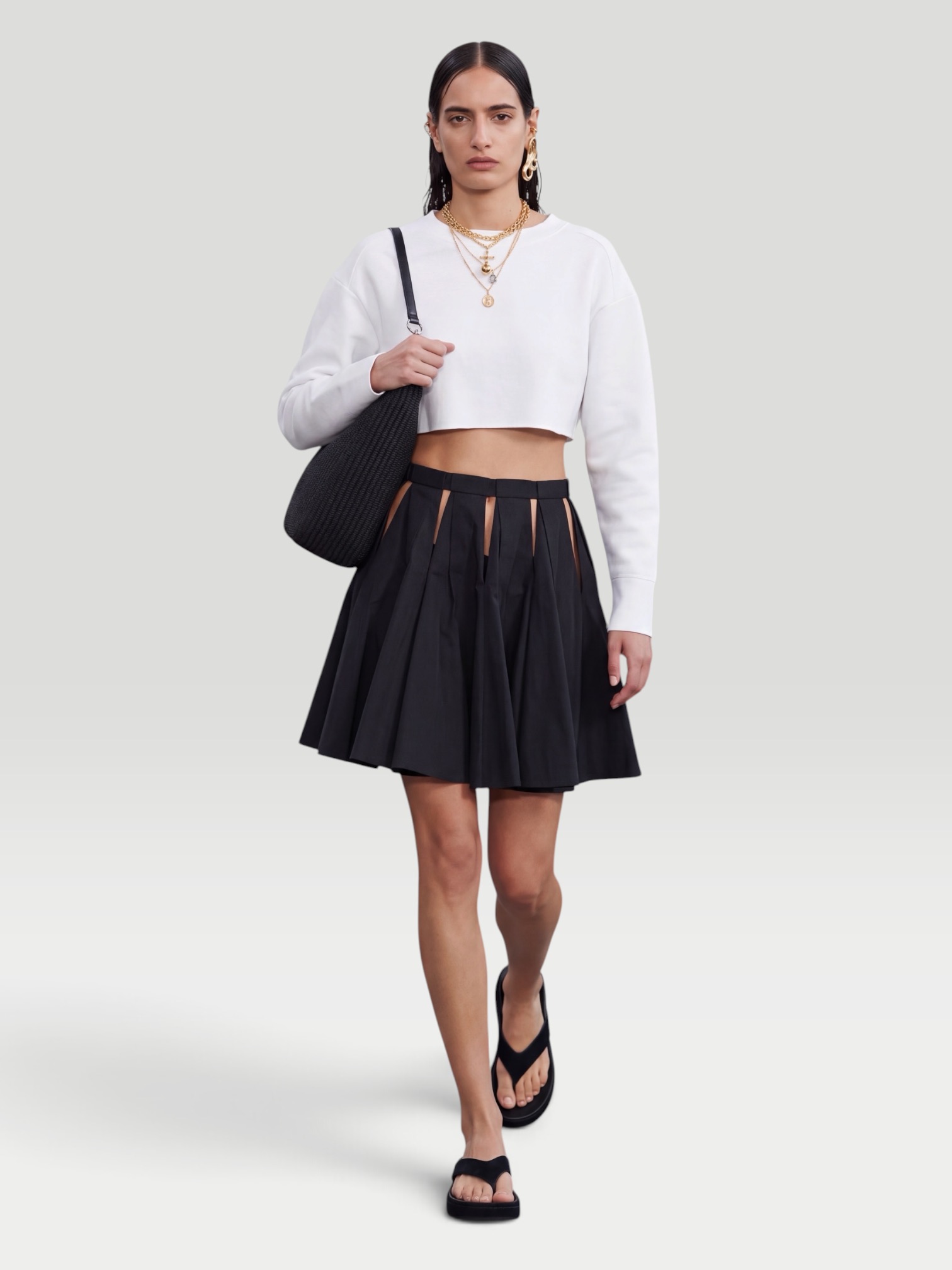 Alaïa Pleated Miniskirt in noir / palladium hardware. Styled by Sharon Lombardo for FDV Concierge.