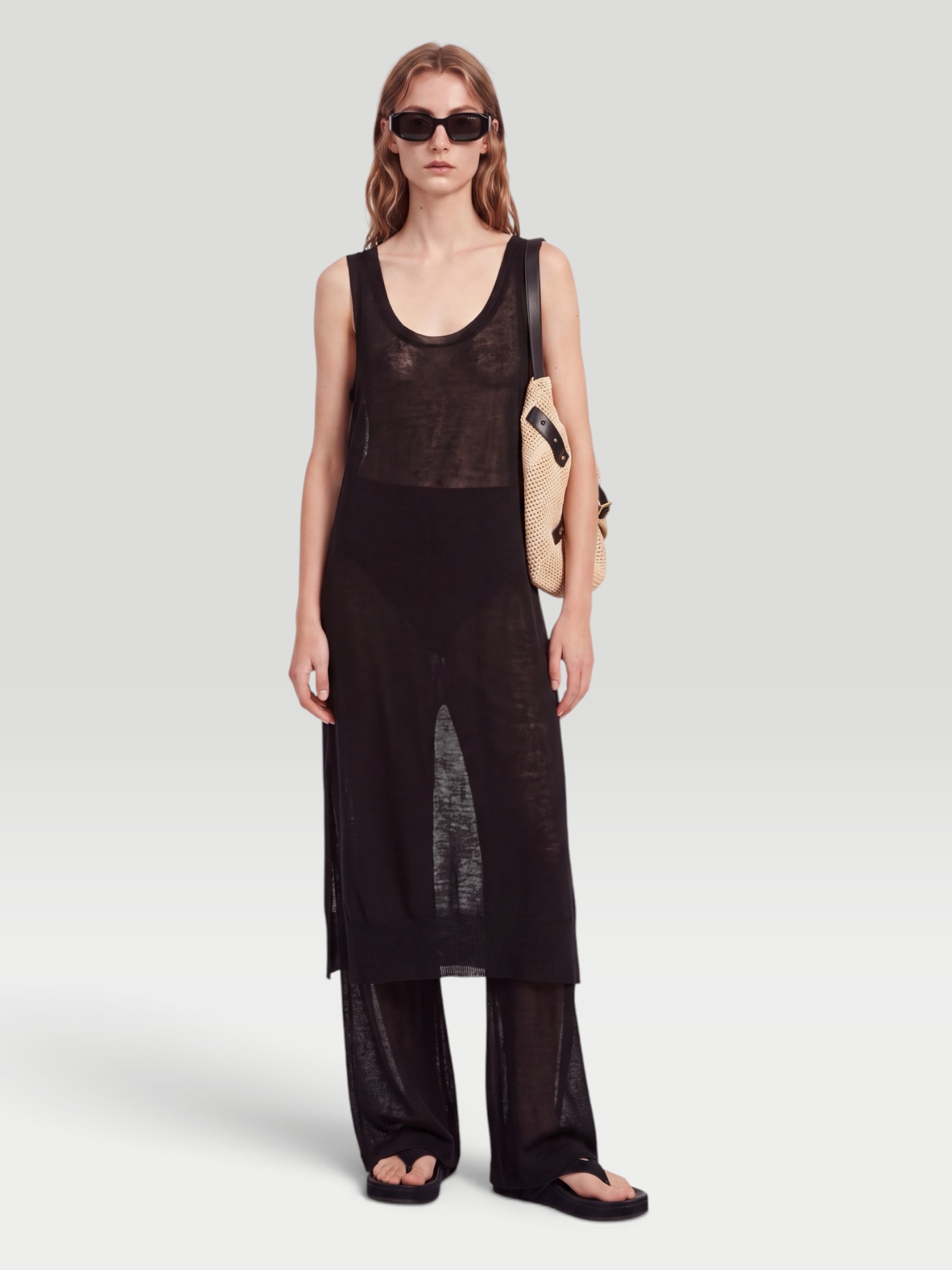 Alaïa Semi-Sheer Linen and Silk Midi Dress in black. Styled by Sharon Lombardo for FDV Concierge.