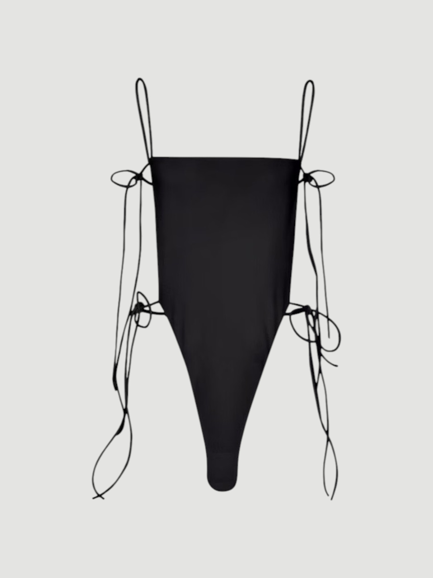 Alaïa Tie One Piece Swimsuit in black. Styled by Sharon Lombardo for FDV Concierge.