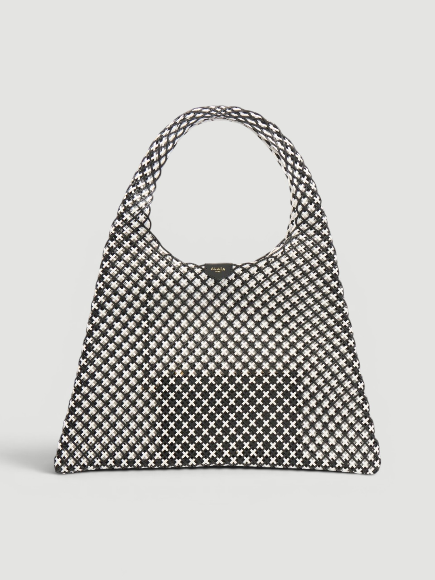 Alaïa Woven Leather Hobo Shoulder Bag in black, worn with St. Agni Relaxed Tee Dress. Styled by Sharon Lombardo for FDV Concierge.