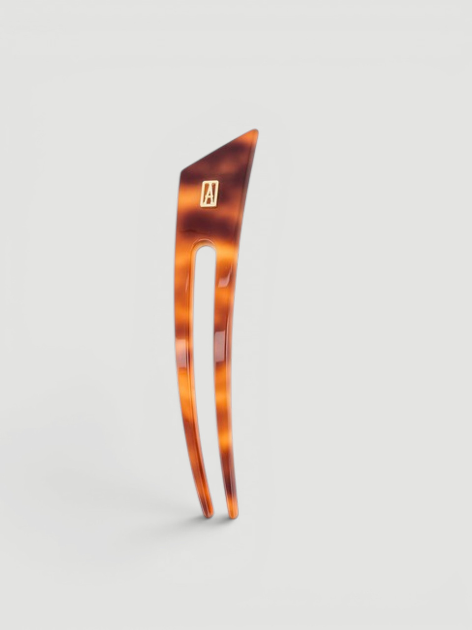Alexandre de Paris Anvers Acetate Hair Pin in brown.