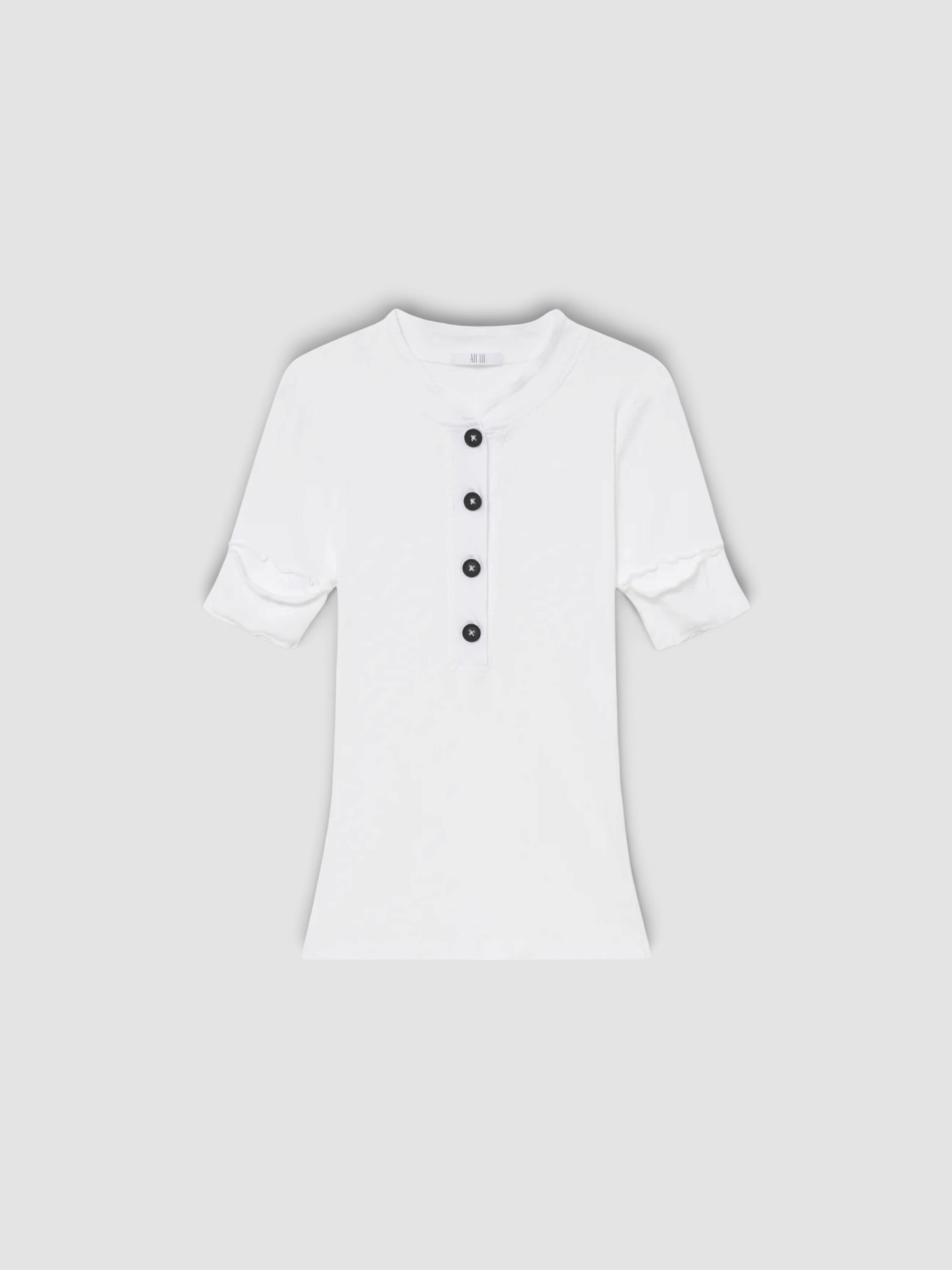 All Three Sasha Rib Henley in white. Styled by Sharon Lombardo for FDV Concierge.