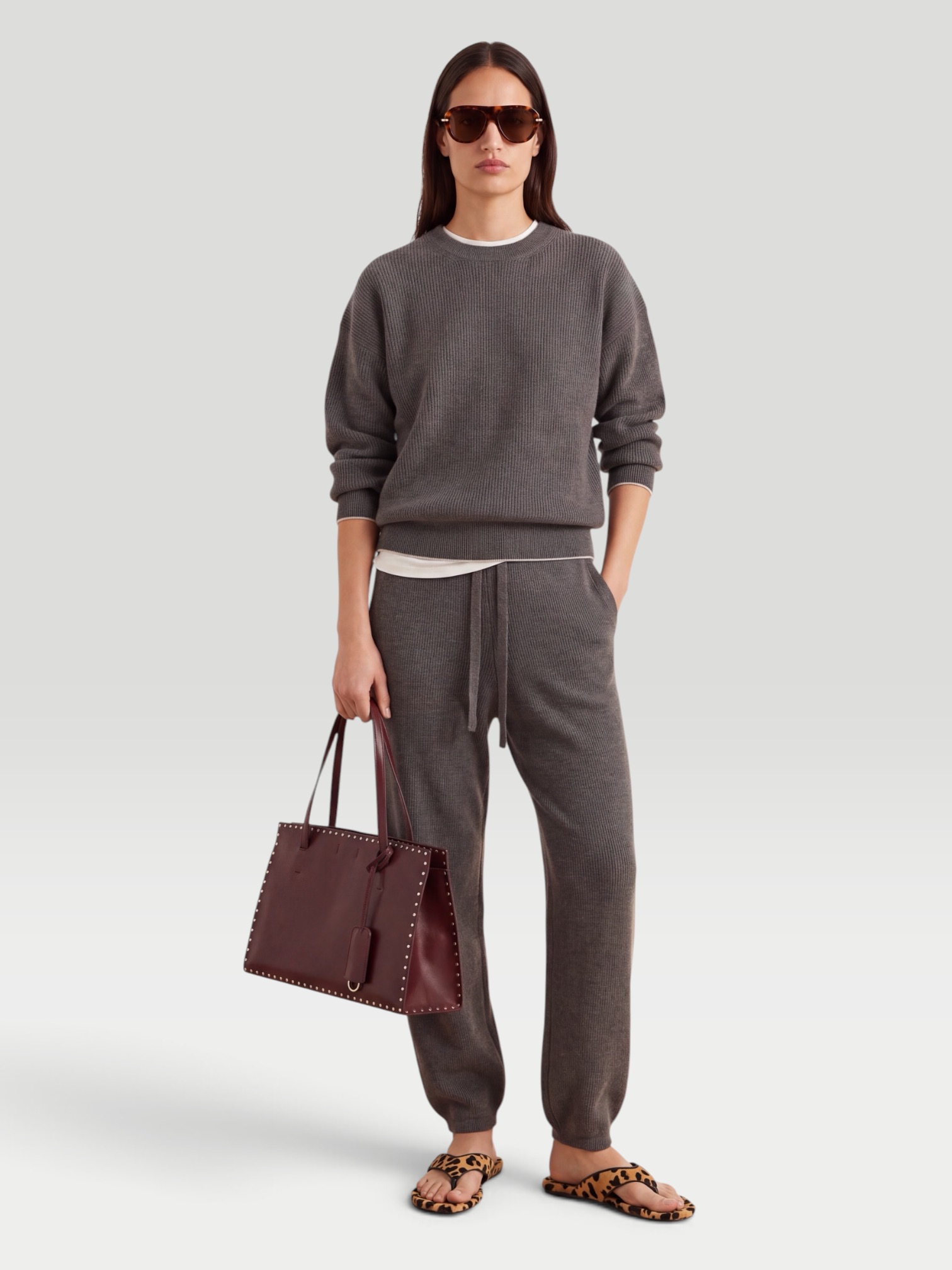 ARCH4 Elsa Ribbed Cashmere Sweater and Pants Set in olive. Styled by Sharon Lombardo for FDV Concierge.