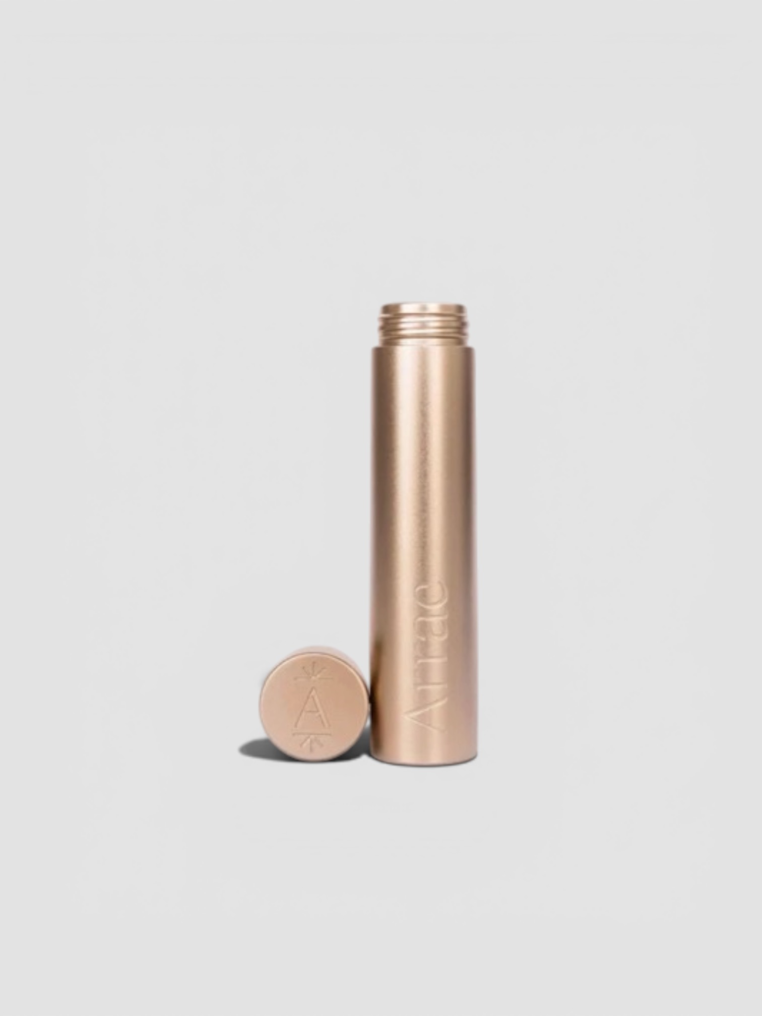 Arrae Travel Capsule Case in rose gold.