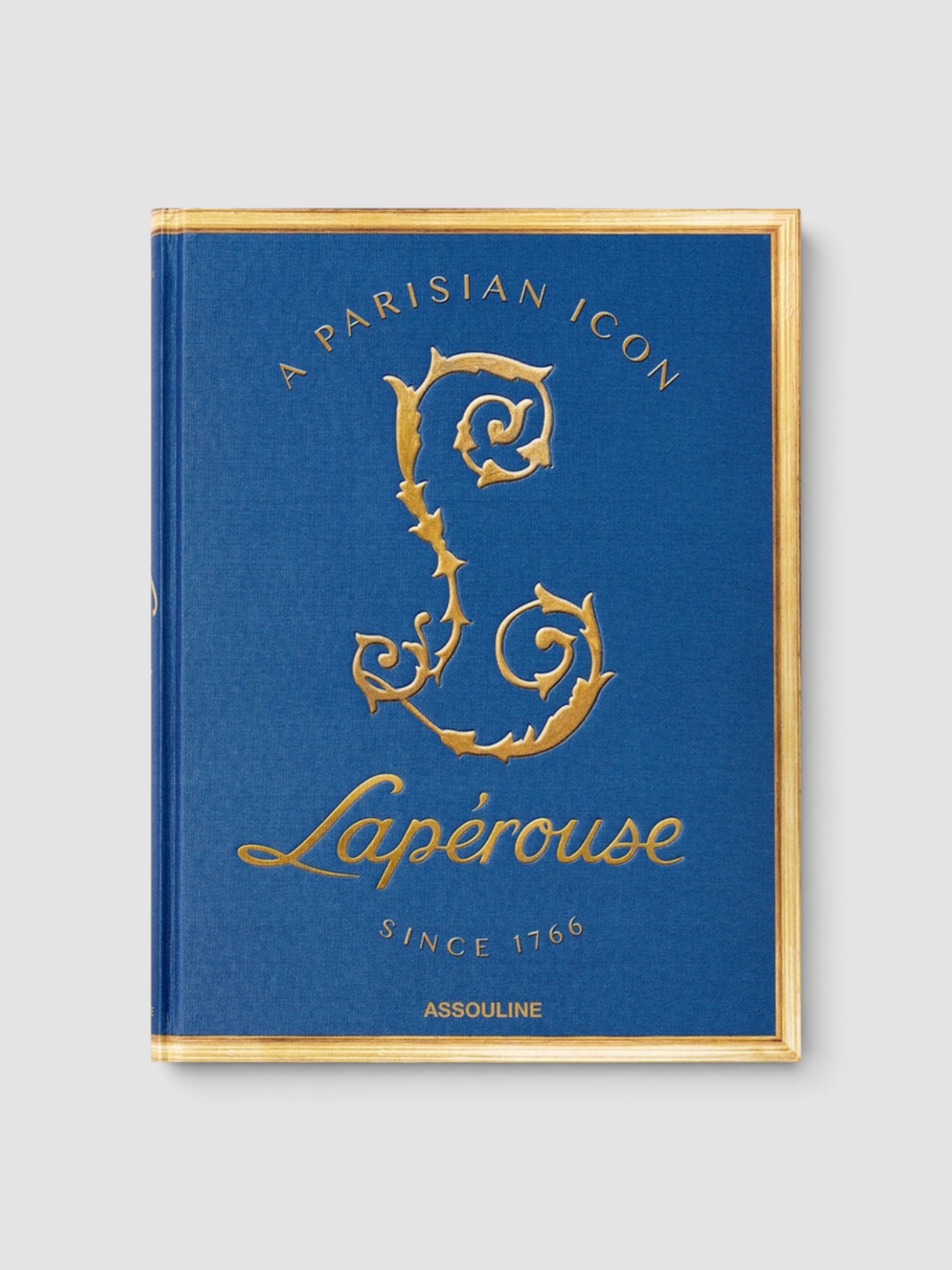 Assouline Laperouse: A Parisian Icon Since 1766 in blue.