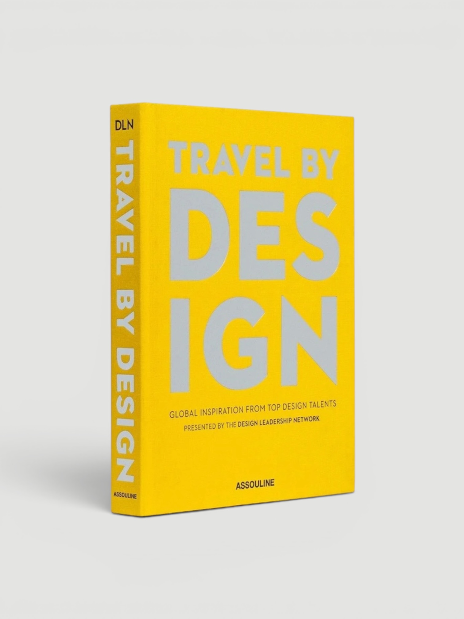 Assouline Travel by Design in yellow.