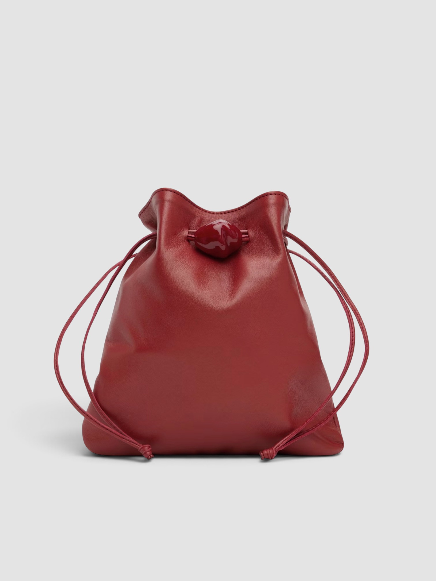 Ayllón Casilda Pouch in red, worn with FIL DE VIE Isadora Dress. Styled by Sharon Lombardo for FDV Concierge.