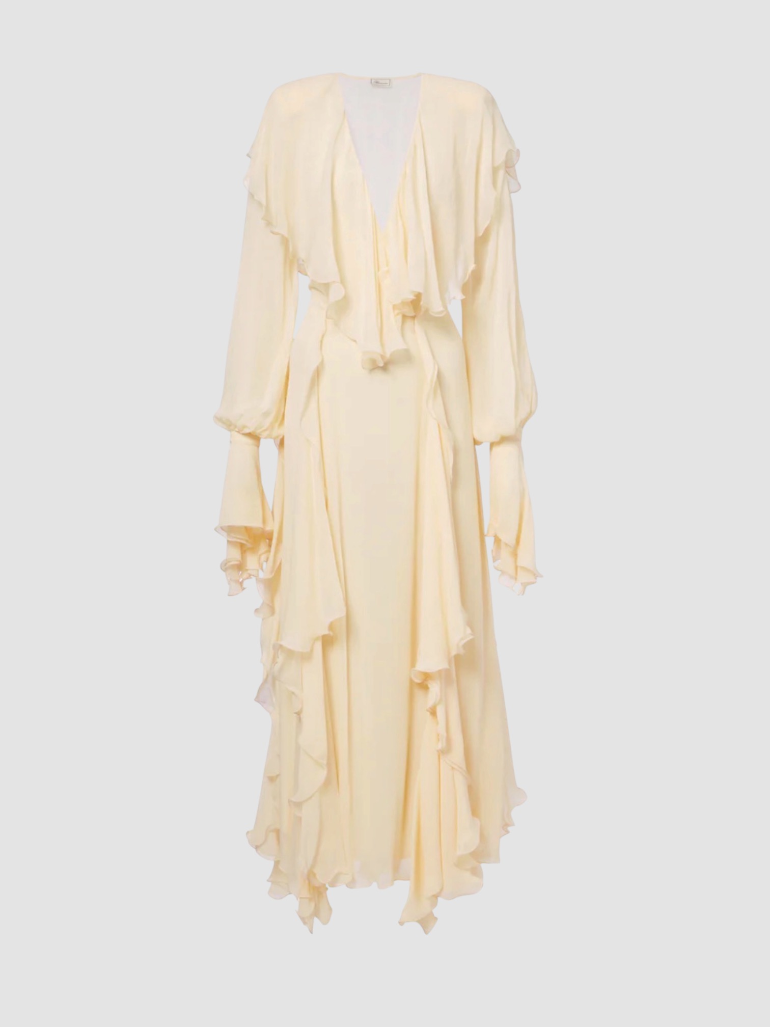 Blumarine Ruffled Maxi Dress in beige, worn with Phoebe Philo Frizz Flip Flop. Styled by Sharon Lombardo for FDV Concierge.