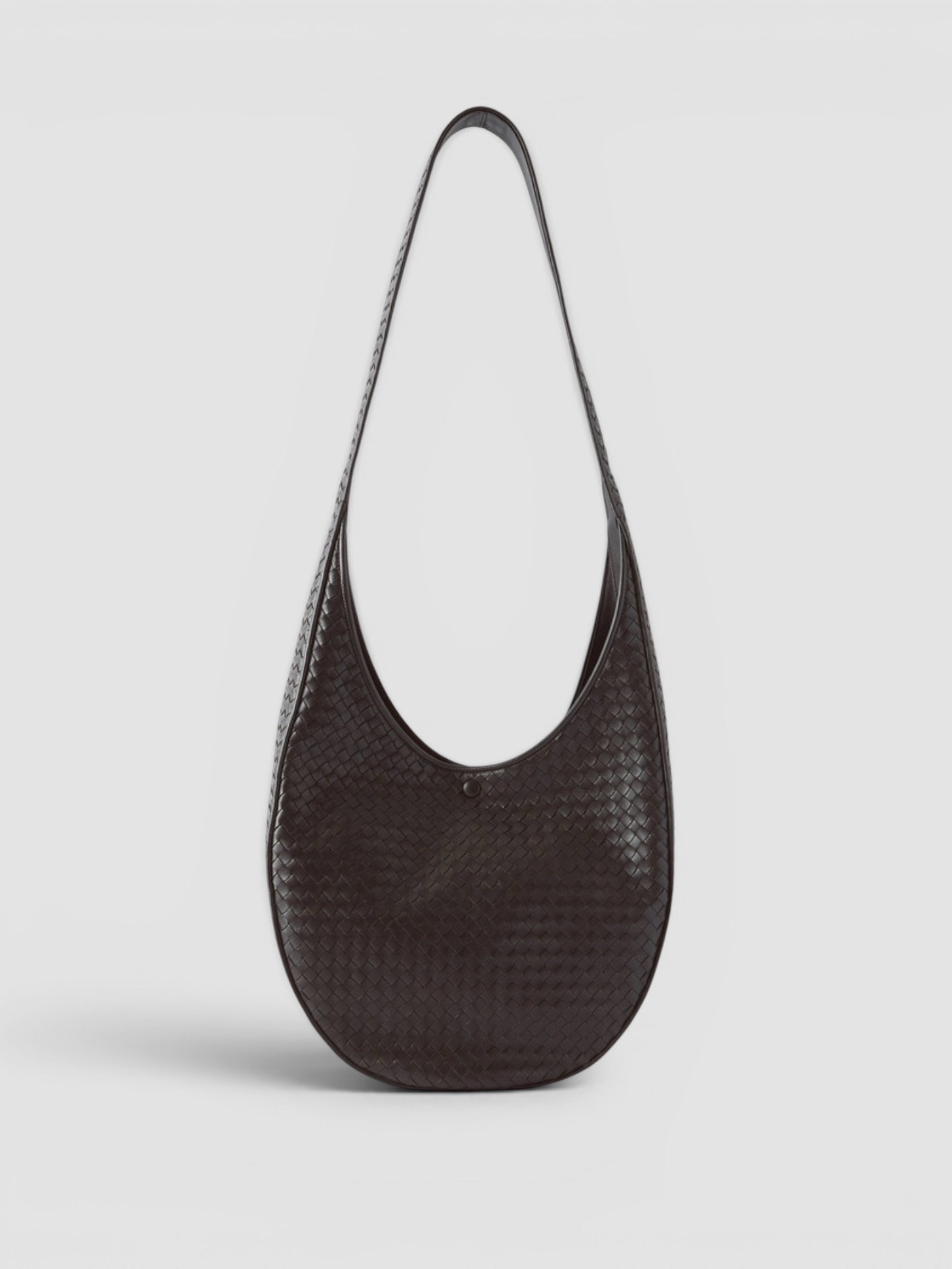 Bottega Veneta Ovetto Intrecciato Leather Shoulder Bag in fondant, worn with HEIRLOME Monica Dress. Styled by Sharon Lombardo for FDV Concierge.