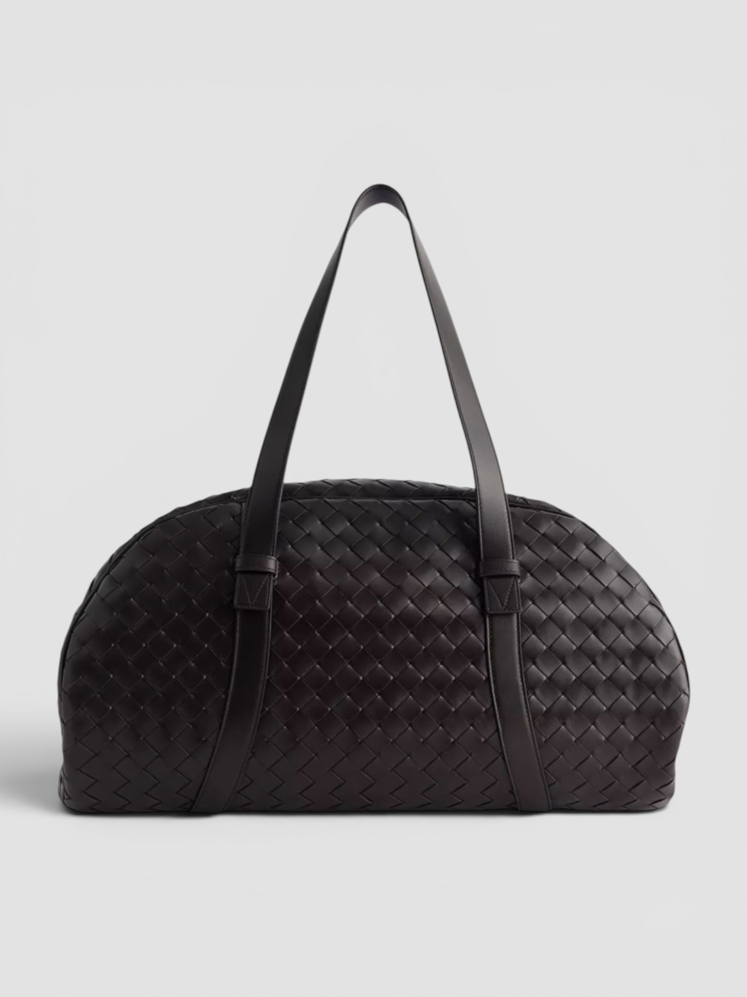 Bottega Veneta Intrecciato Leather Duffle Bag in black.
