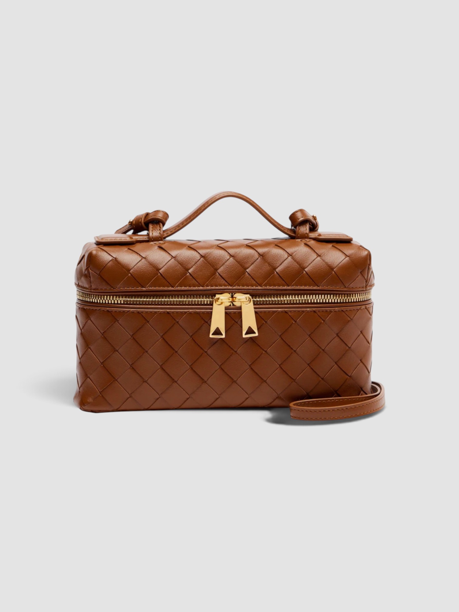 Bottega Veneta Bang Bang Intrecciato Leather Vanity Bag in brown, worn with Totême Striped Shirtdress. Styled by Sharon Lombardo for FDV Concierge.