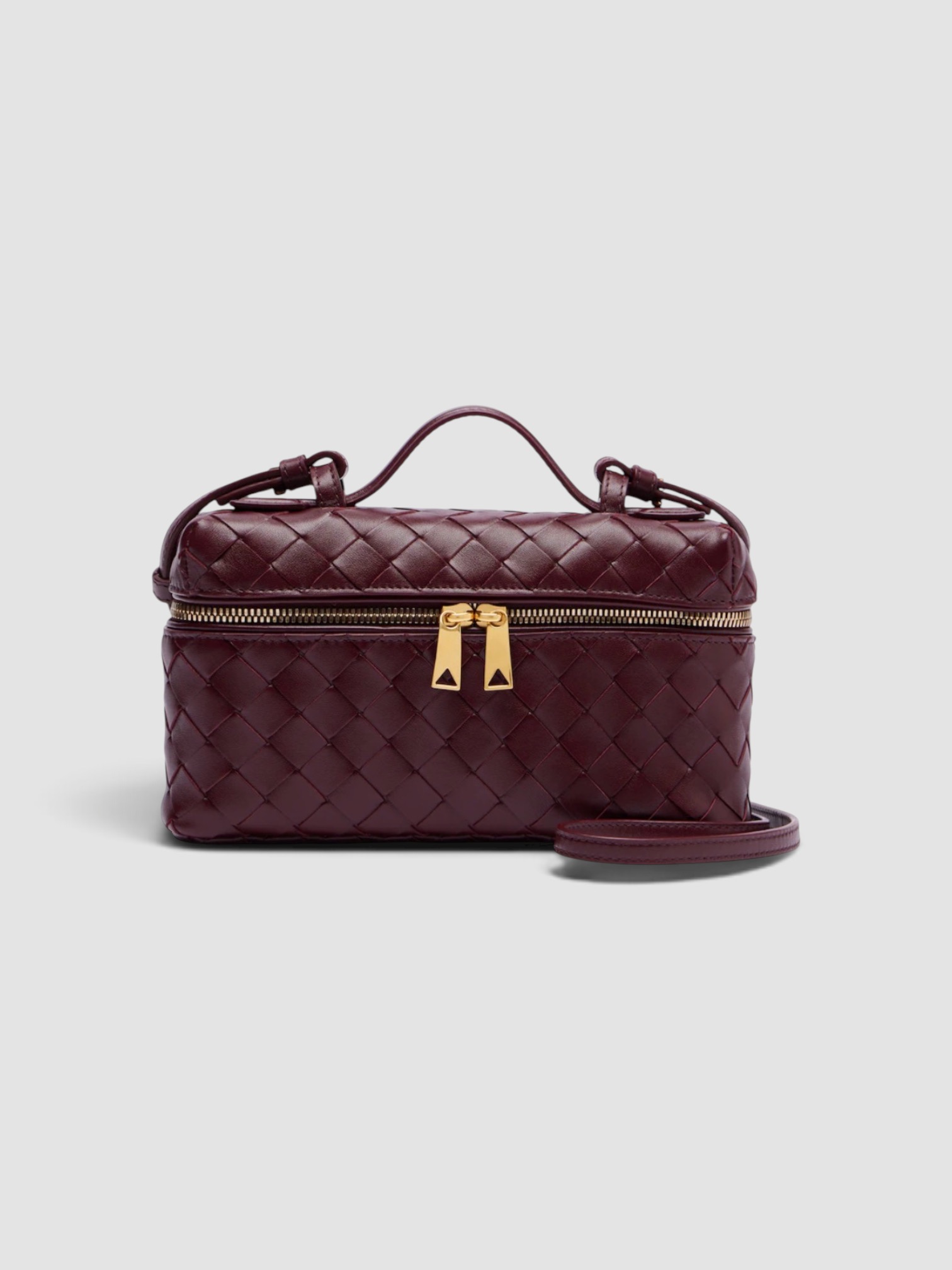 Bottega Veneta Bang Bang Intrecciato Leather Vanity Bag in burgundy, worn with FIL DE VIE Isadora Dress. Styled by Sharon Lombardo for FDV Concierge.