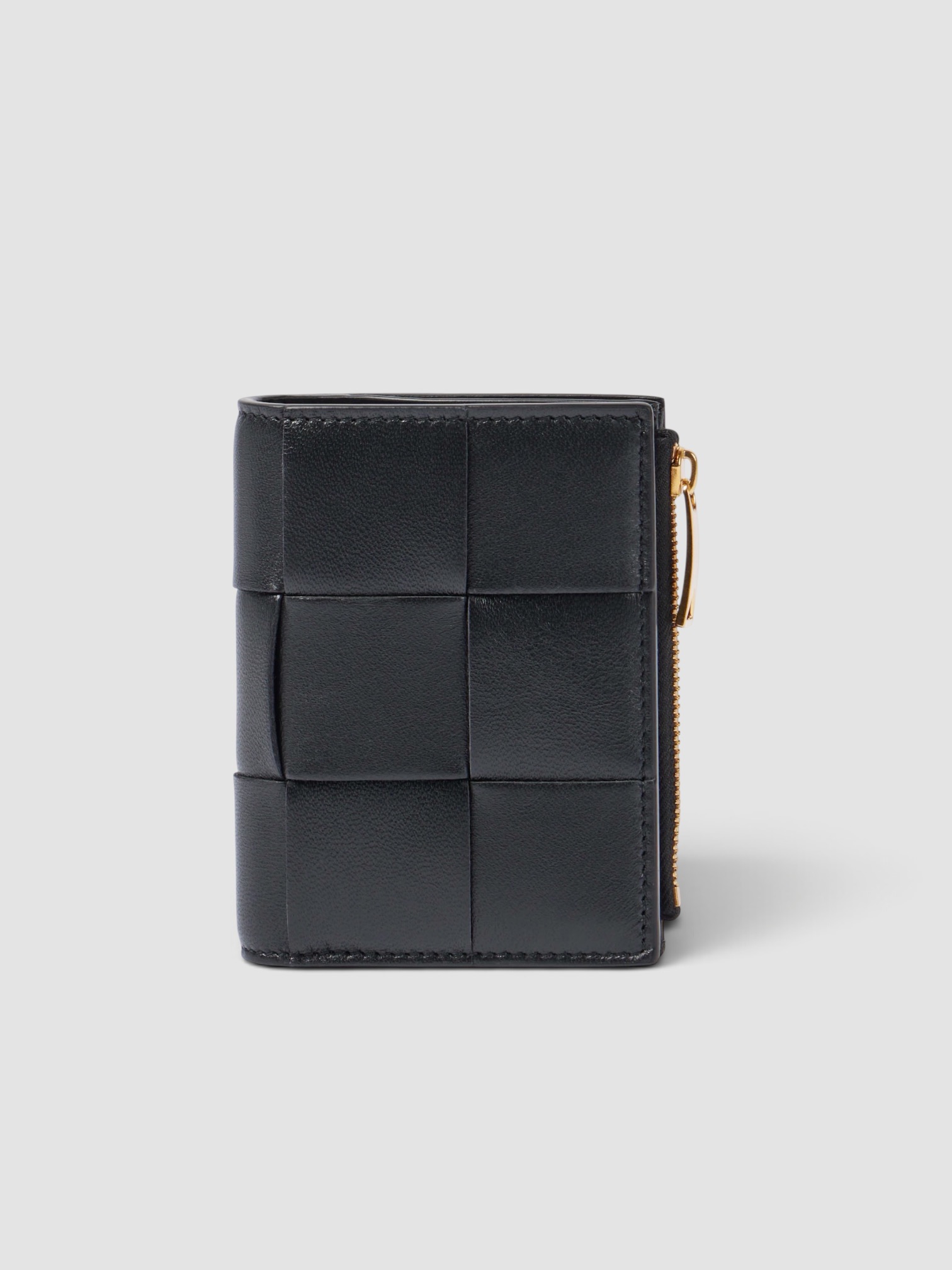 Bottega Veneta Cassette Small Bi-Fold Wallet in black.