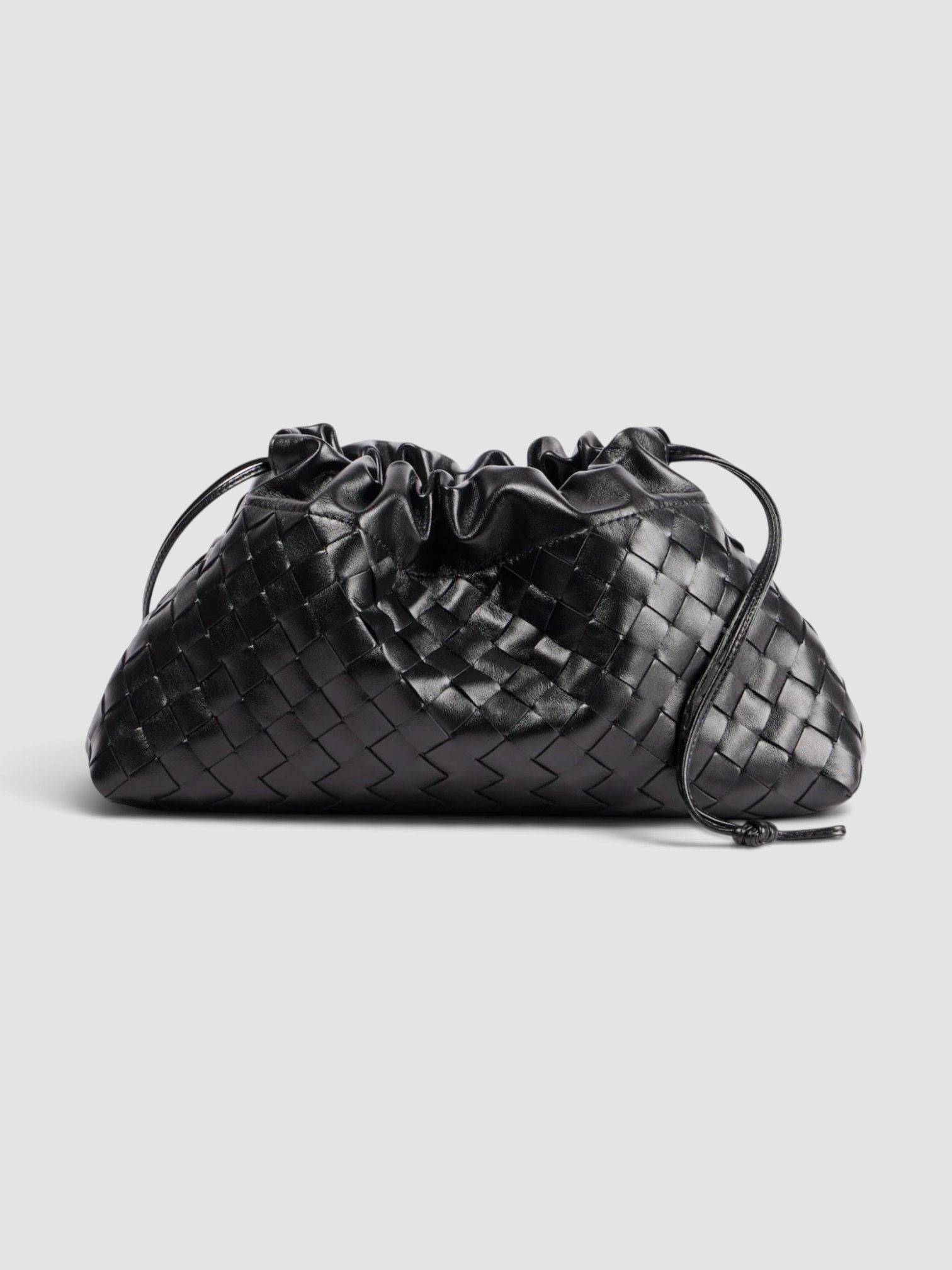 Bottega Veneta Dustbag Soirée Medium Leather Clutch in black, worn with FIL DE VIE Isadora Dress. Styled by Sharon Lombardo for FDV Concierge.